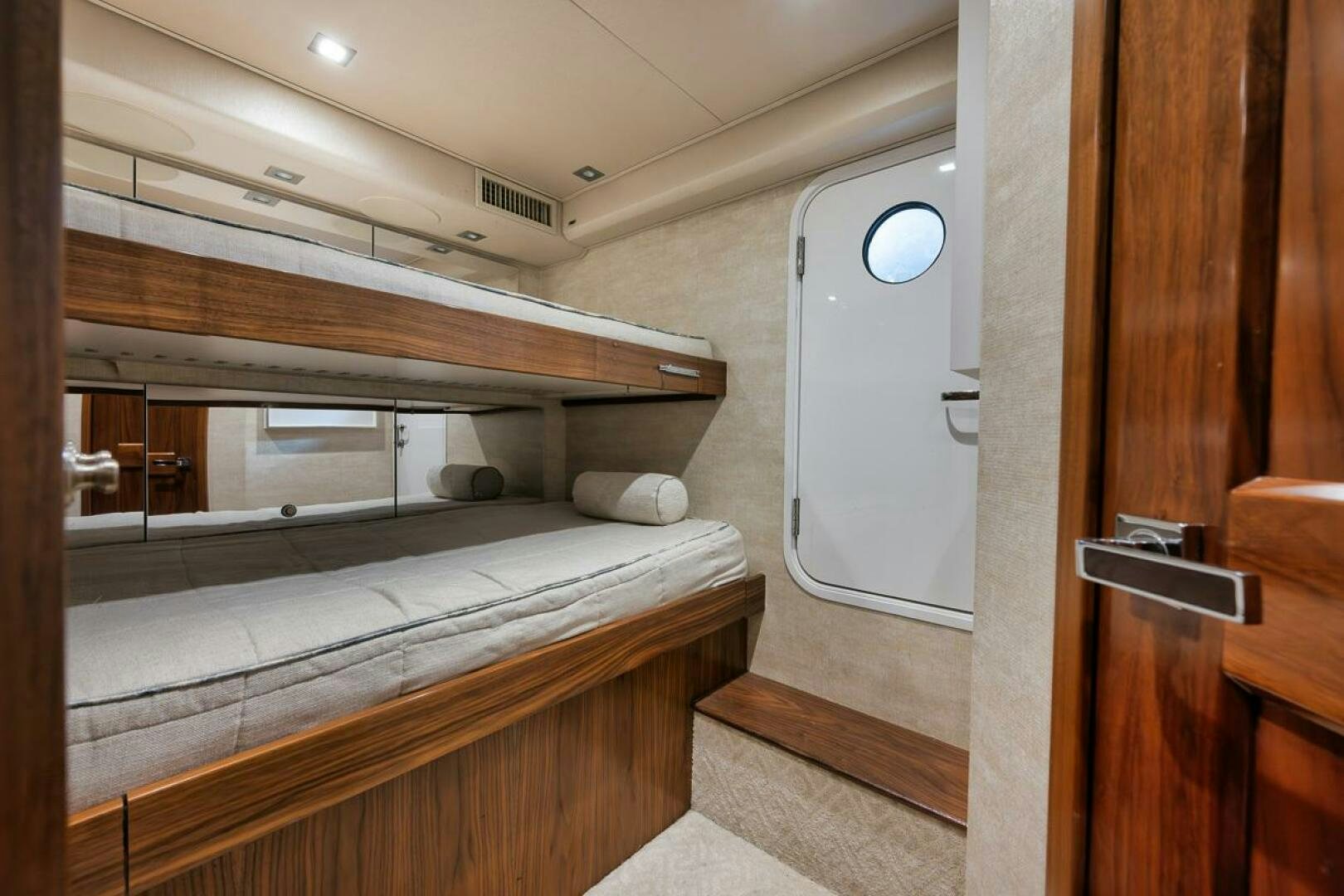 a room with bunk beds aboard JO-LI Yacht for Sale