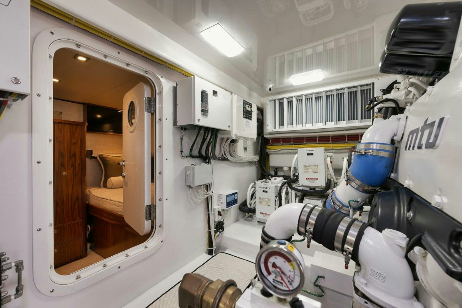 a machine in a room aboard JO-LI Yacht for Sale