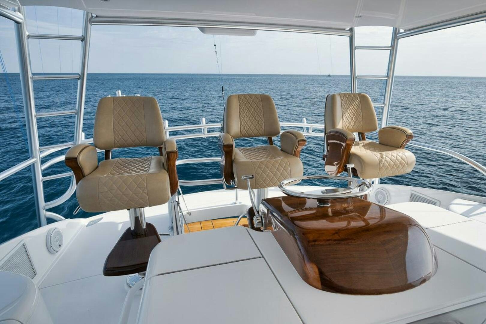 a group of chairs on a boat aboard JO-LI Yacht for Sale