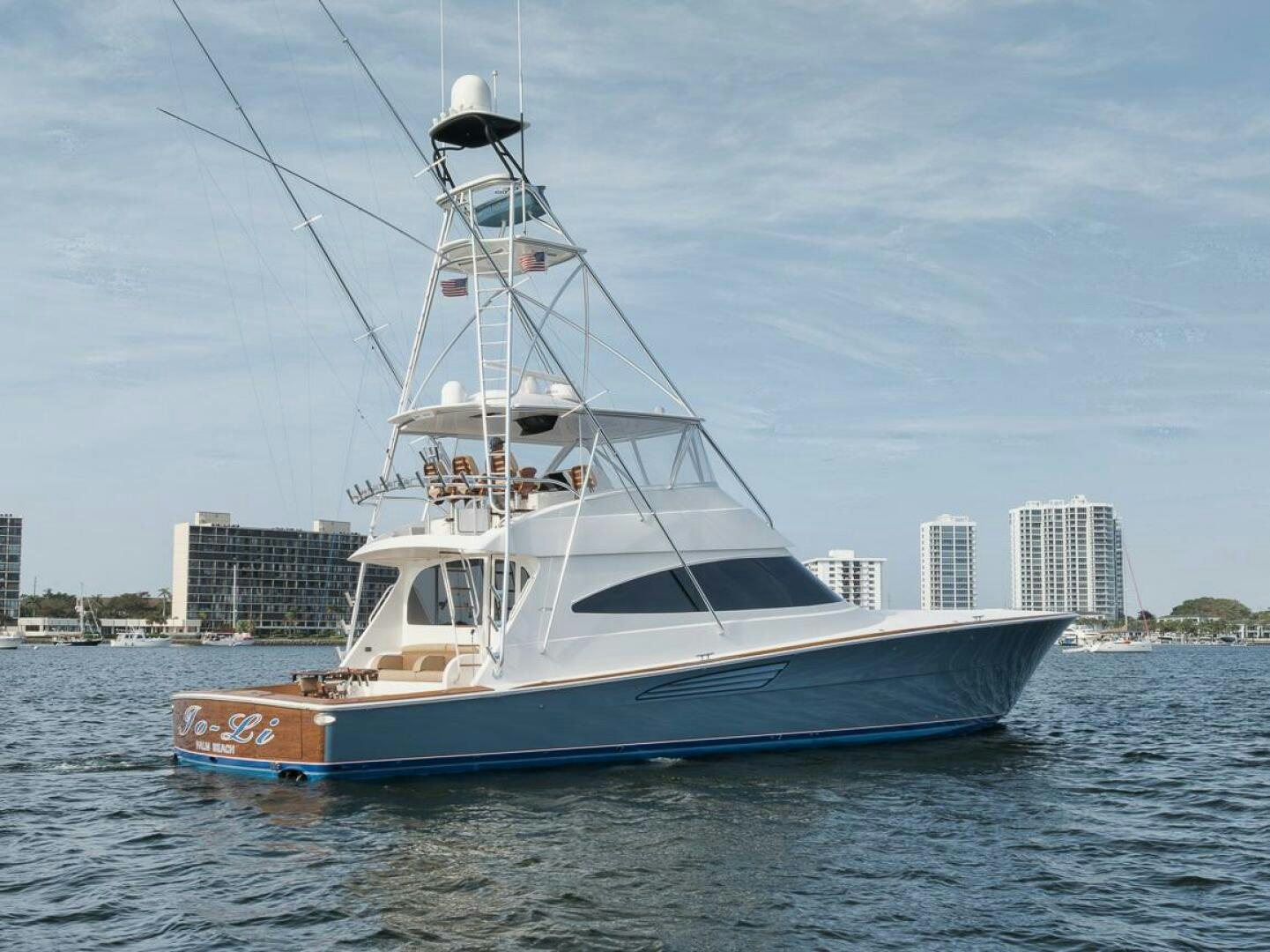 a large white boat in the water aboard JO-LI Yacht for Sale