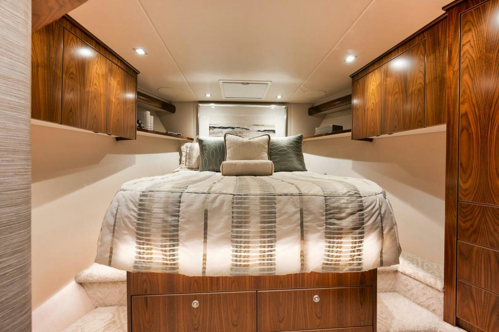 a bed in a room aboard JO-LI Yacht for Sale