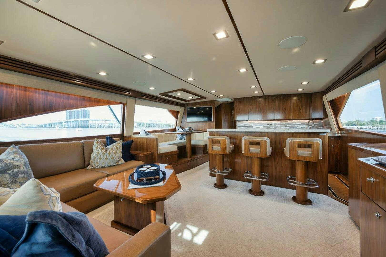 a living room with a couch and a table aboard JO-LI Yacht for Sale