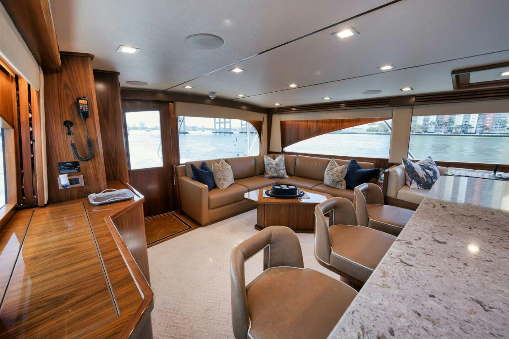 a living room with a large window aboard JO-LI Yacht for Sale