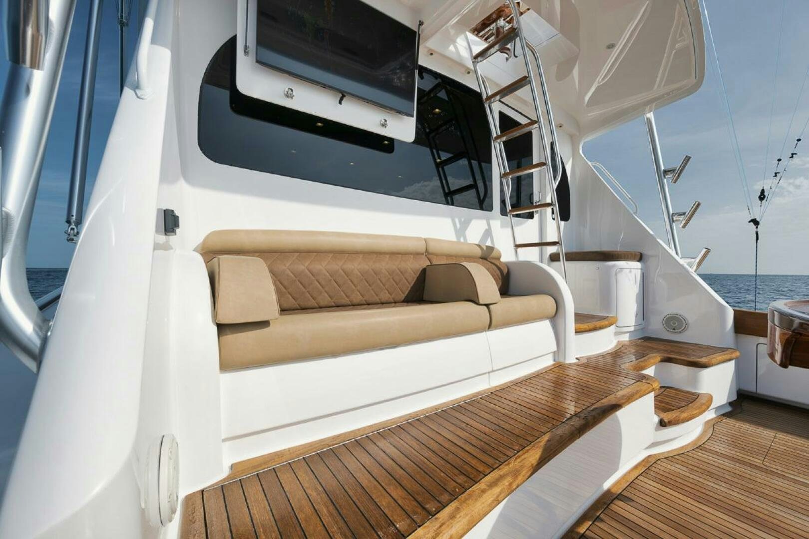 a boat with a couch aboard JO-LI Yacht for Sale