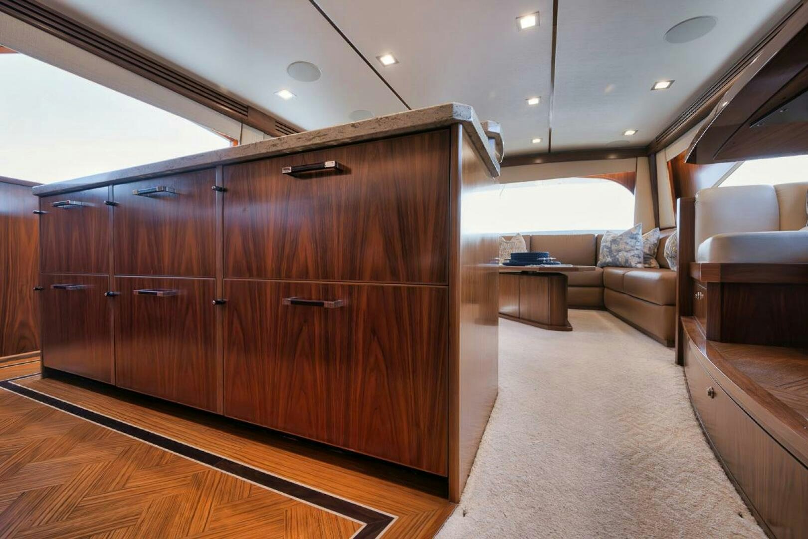 a room with a wood cabinet aboard JO-LI Yacht for Sale