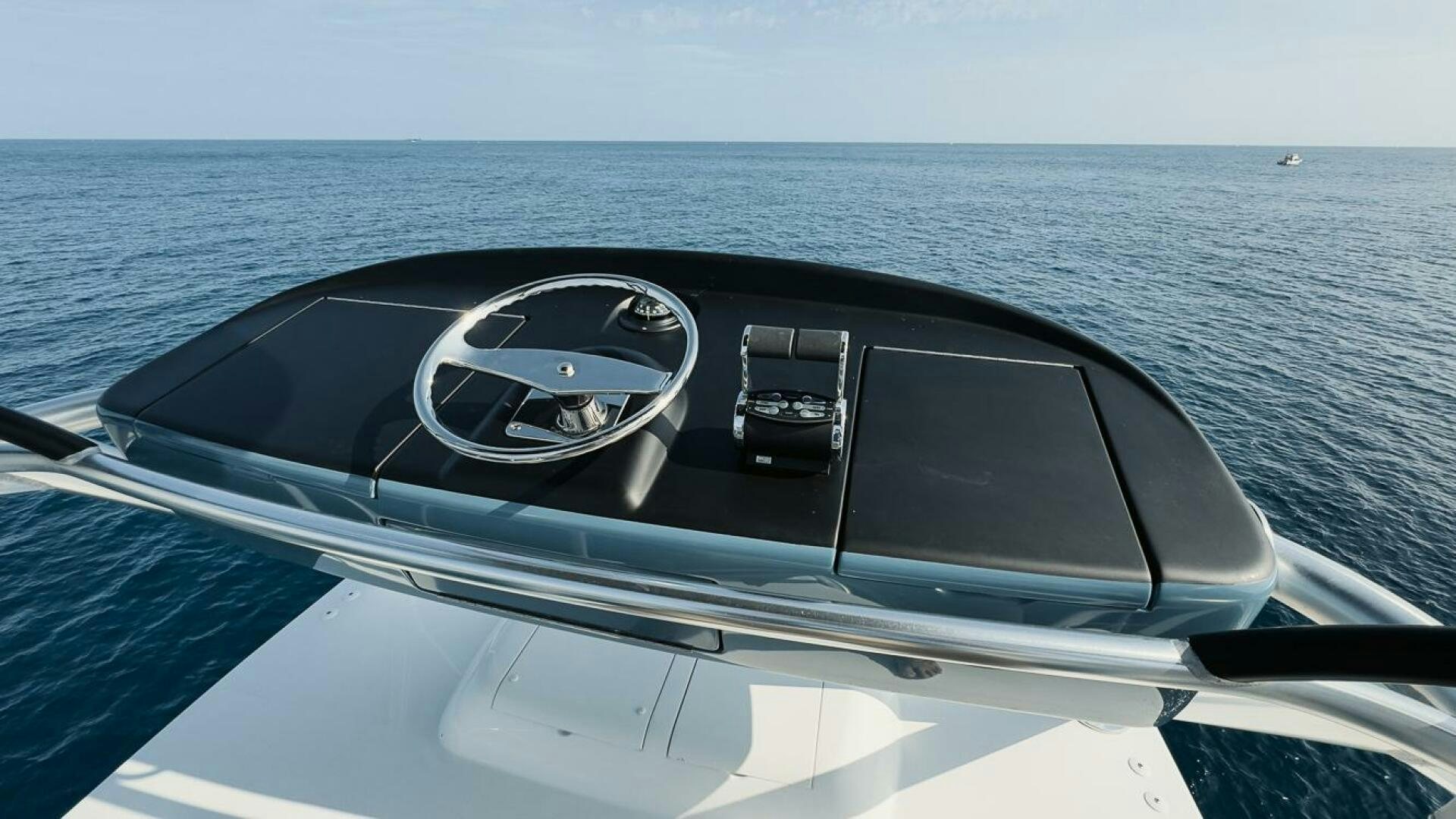 the front of a car on a boat aboard JO-LI Yacht for Sale