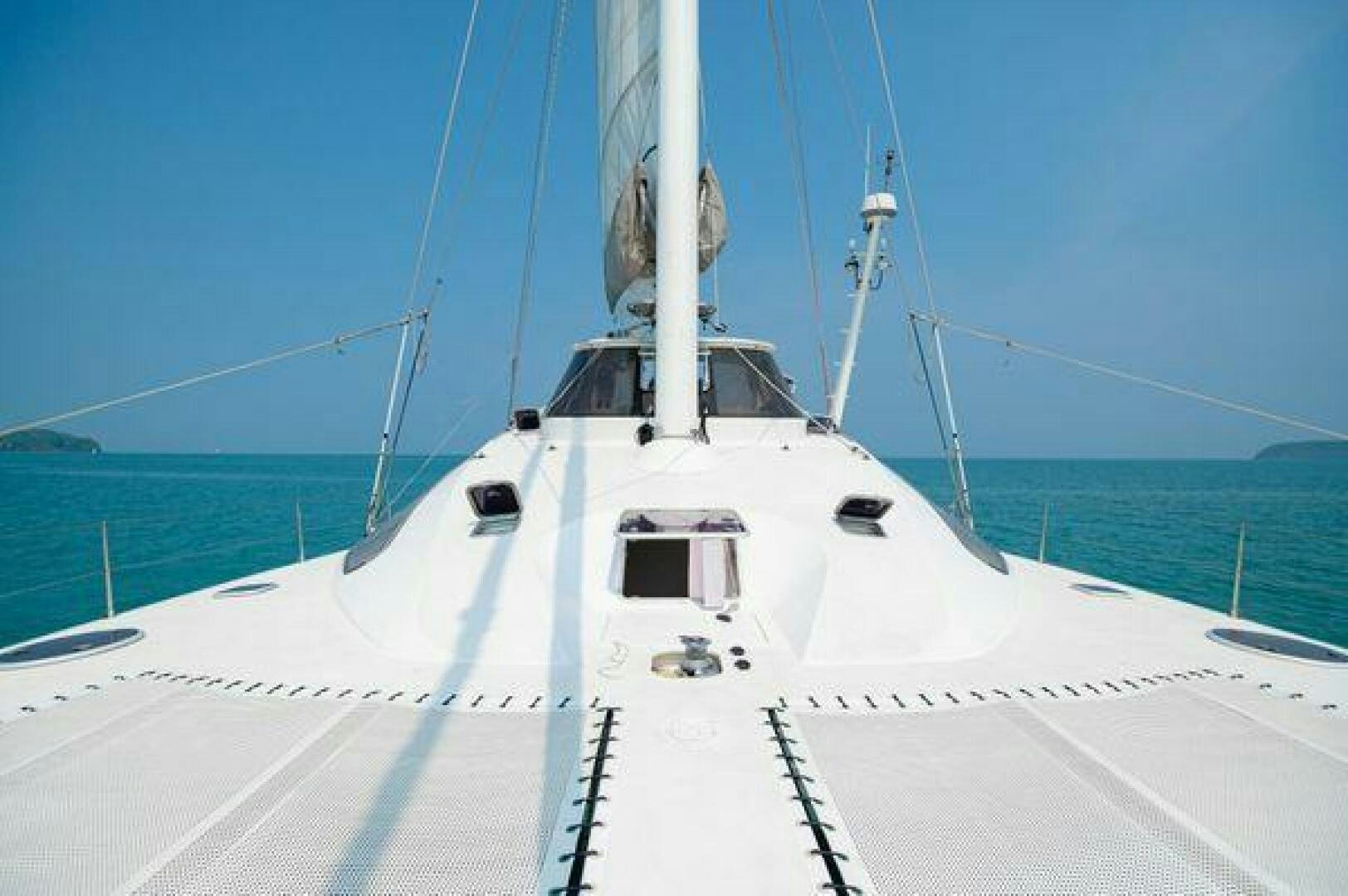 a white boat on a snowy dock aboard SEA CHANT Yacht for Sale