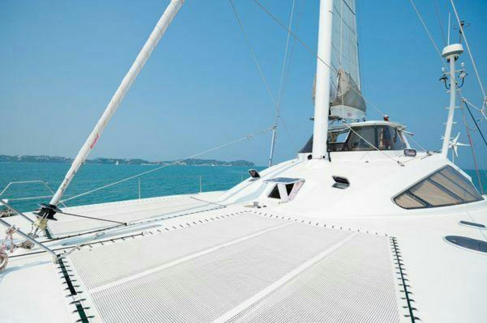 a white boat on a white surface aboard SEA CHANT Yacht for Sale