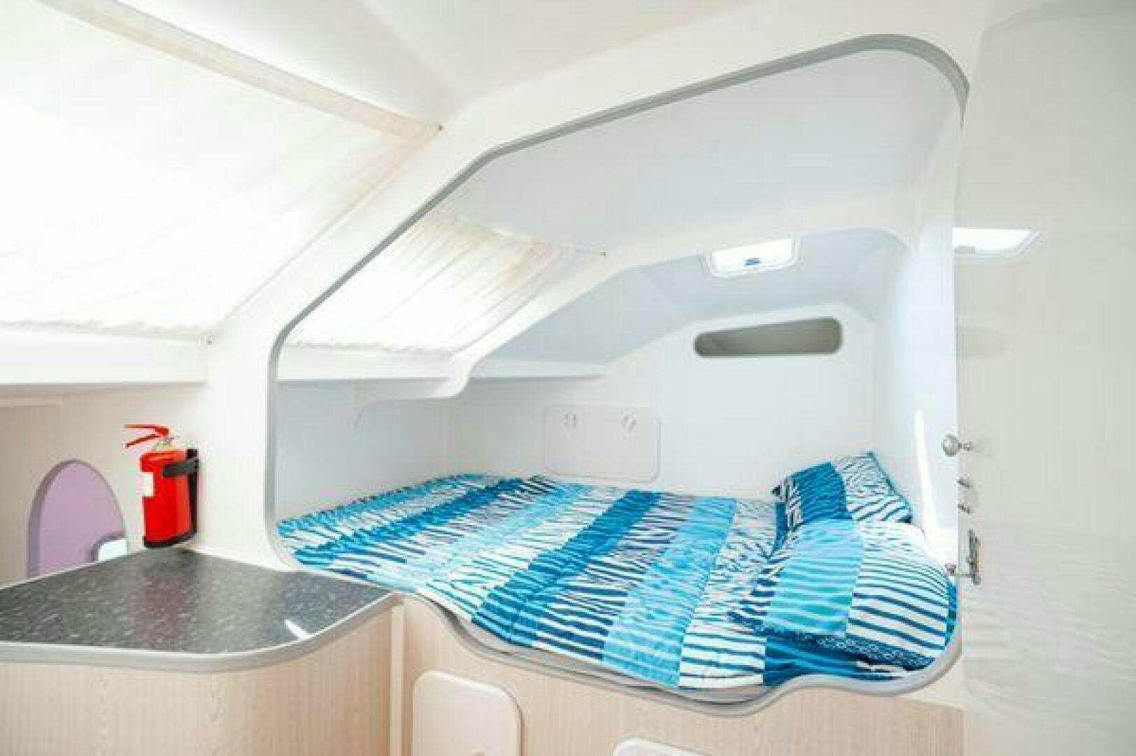 a white machine with blue and white striped fabric aboard SEA CHANT Yacht for Sale