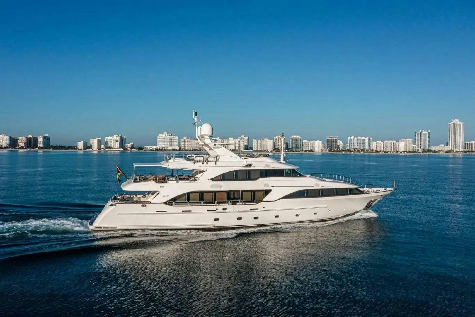 a white yacht on the water aboard ARTHUR’S WAY Yacht for Sale