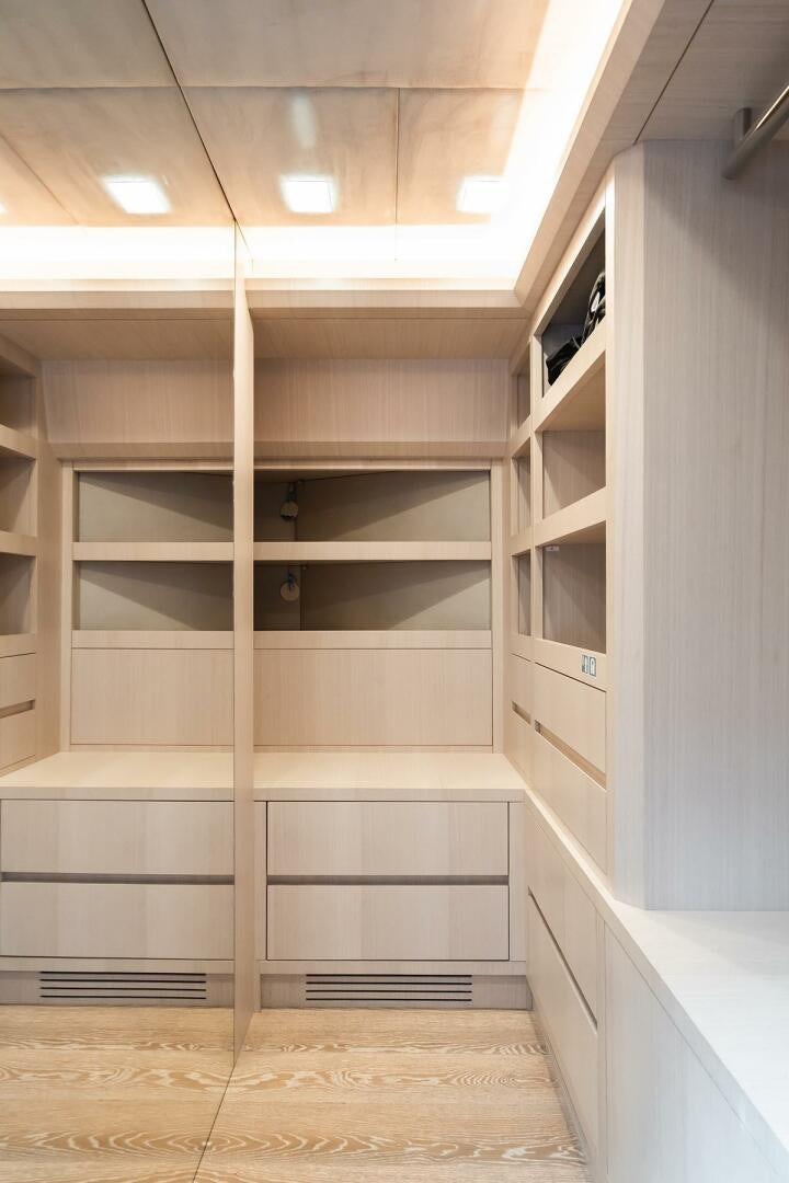 a room with white cabinets aboard ROCCO Yacht for Sale