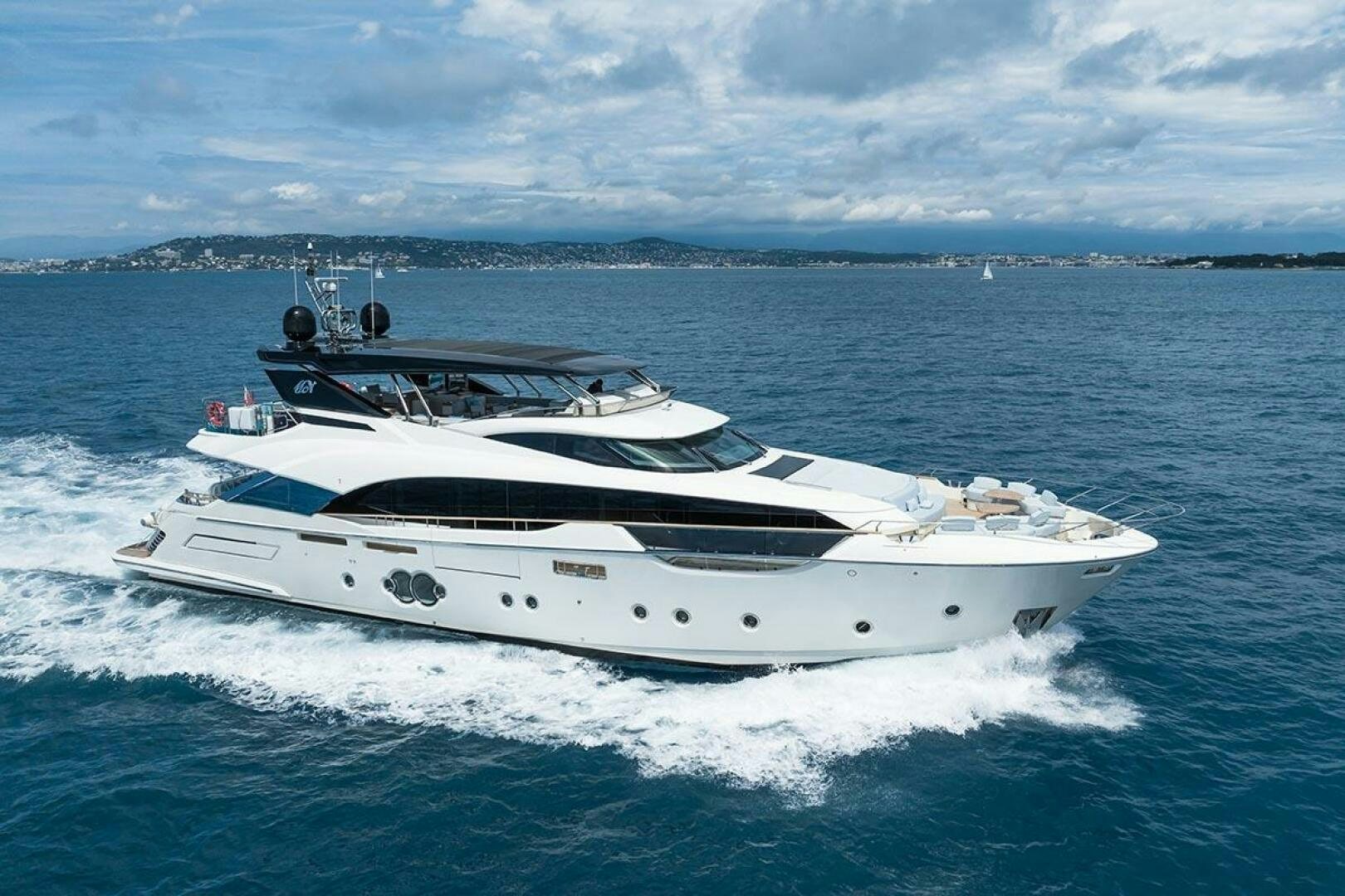 a white yacht on the water aboard ROCCO Yacht for Sale