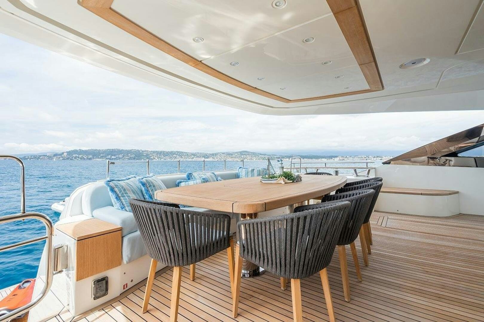 a table and chairs on a boat aboard ROCCO Yacht for Sale