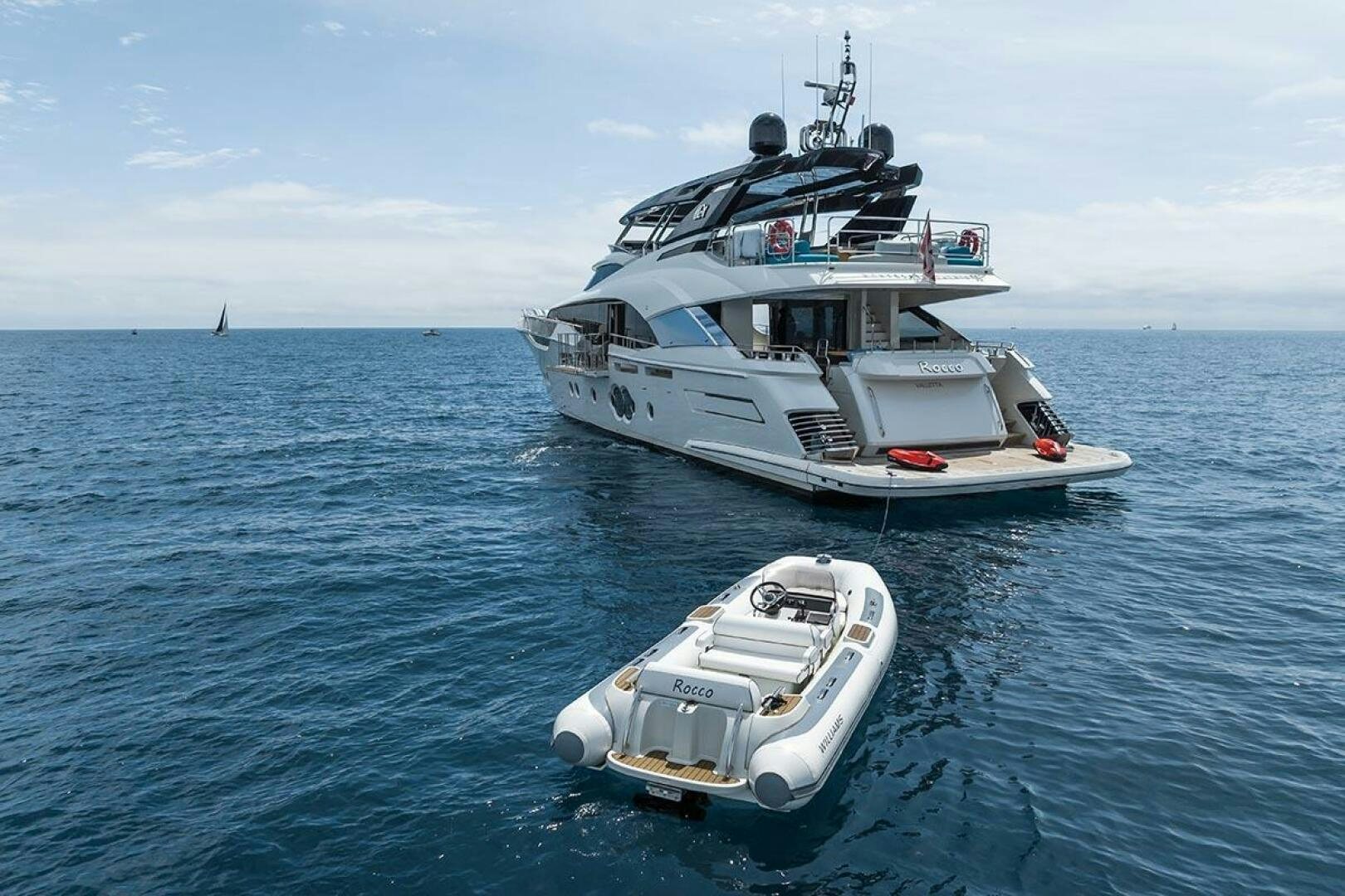 a boat and a boat in the water aboard ROCCO Yacht for Sale