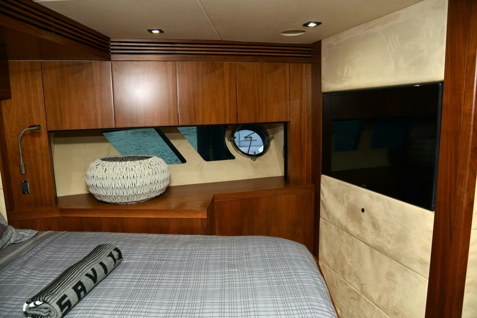 a bed in a room aboard SAVI II  Yacht for Sale
