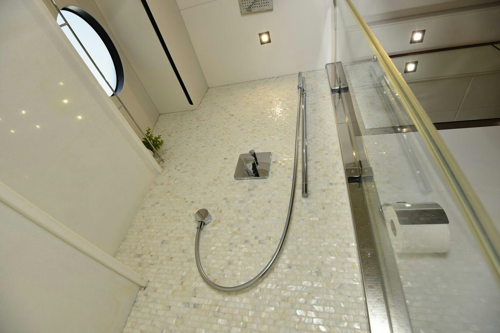 a large empty bathroom aboard SAVI II  Yacht for Sale