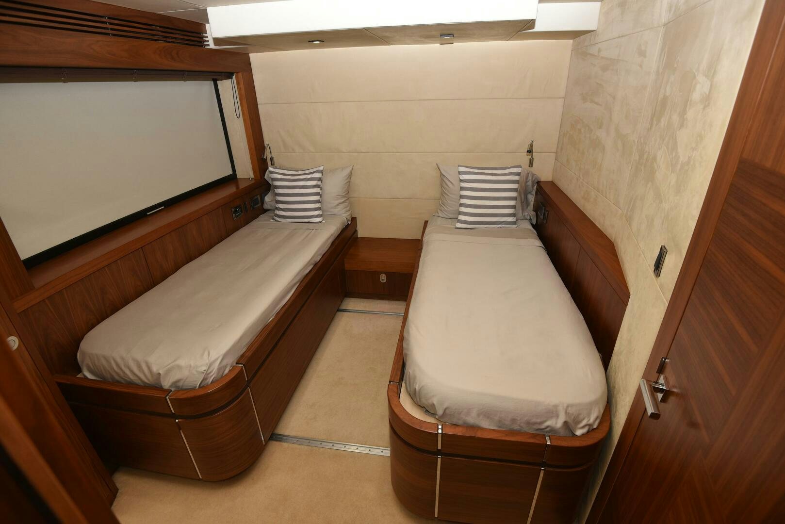 a couple of beds in a room aboard SAVI II  Yacht for Sale