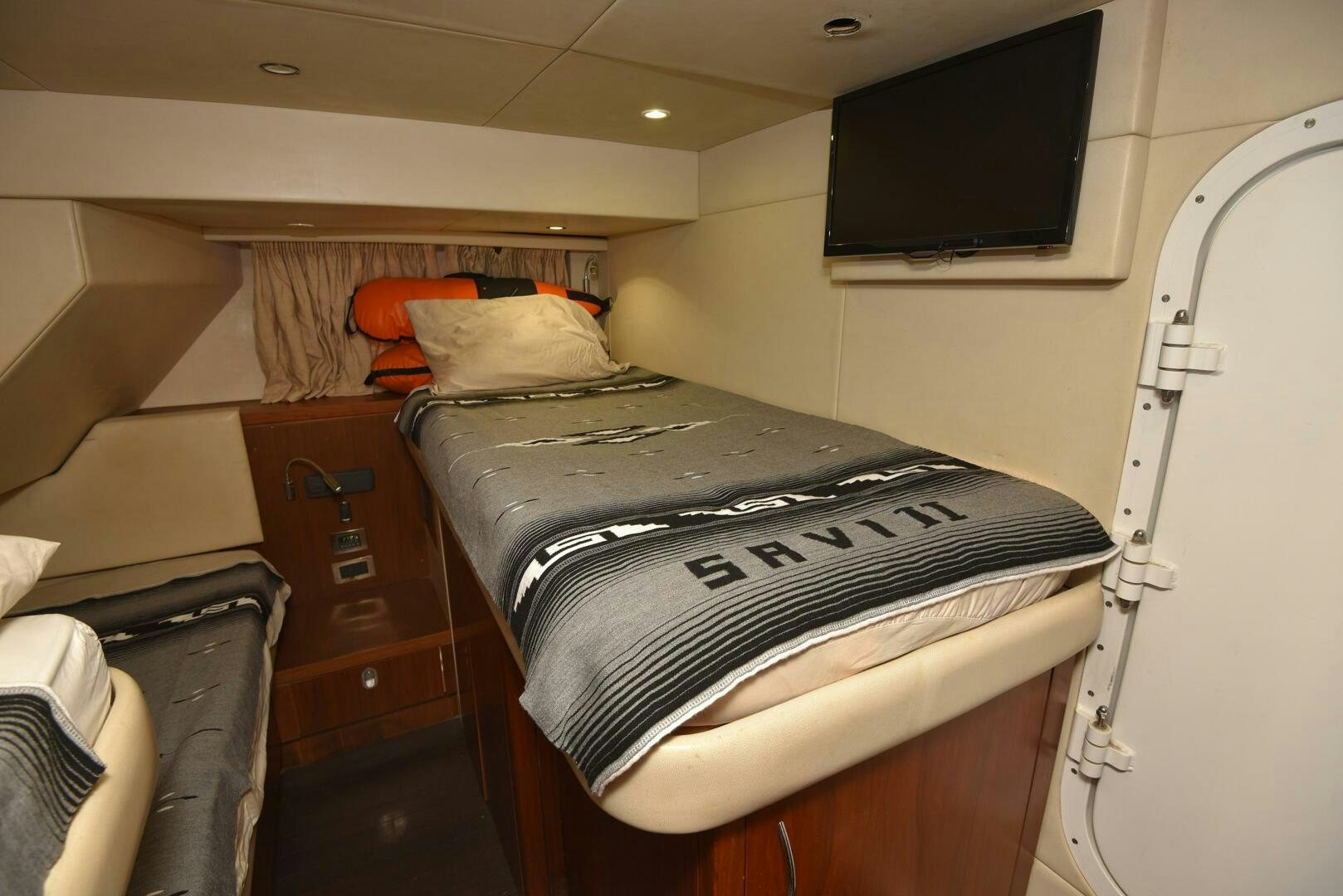 a bed in a room aboard SAVI II  Yacht for Sale