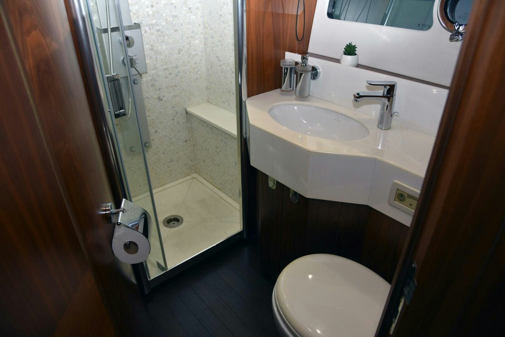 a bathroom with a sink and toilet aboard SAVI II  Yacht for Sale