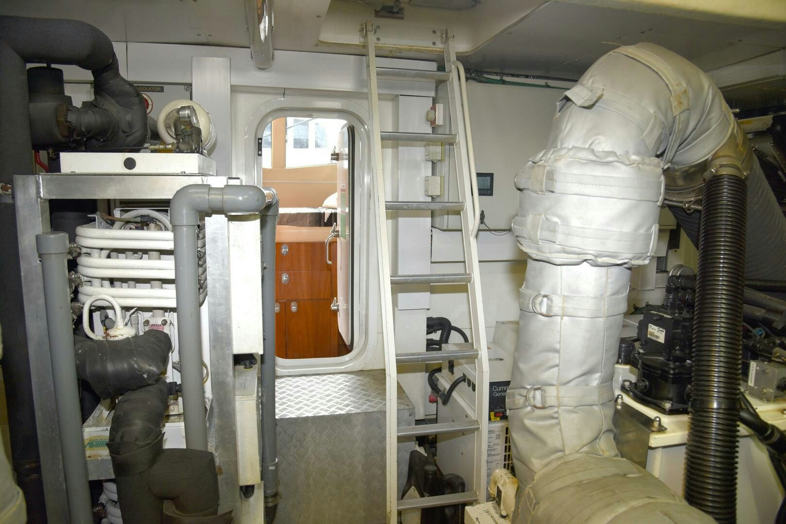 a machine with a large metal pipe aboard SAVI II  Yacht for Sale
