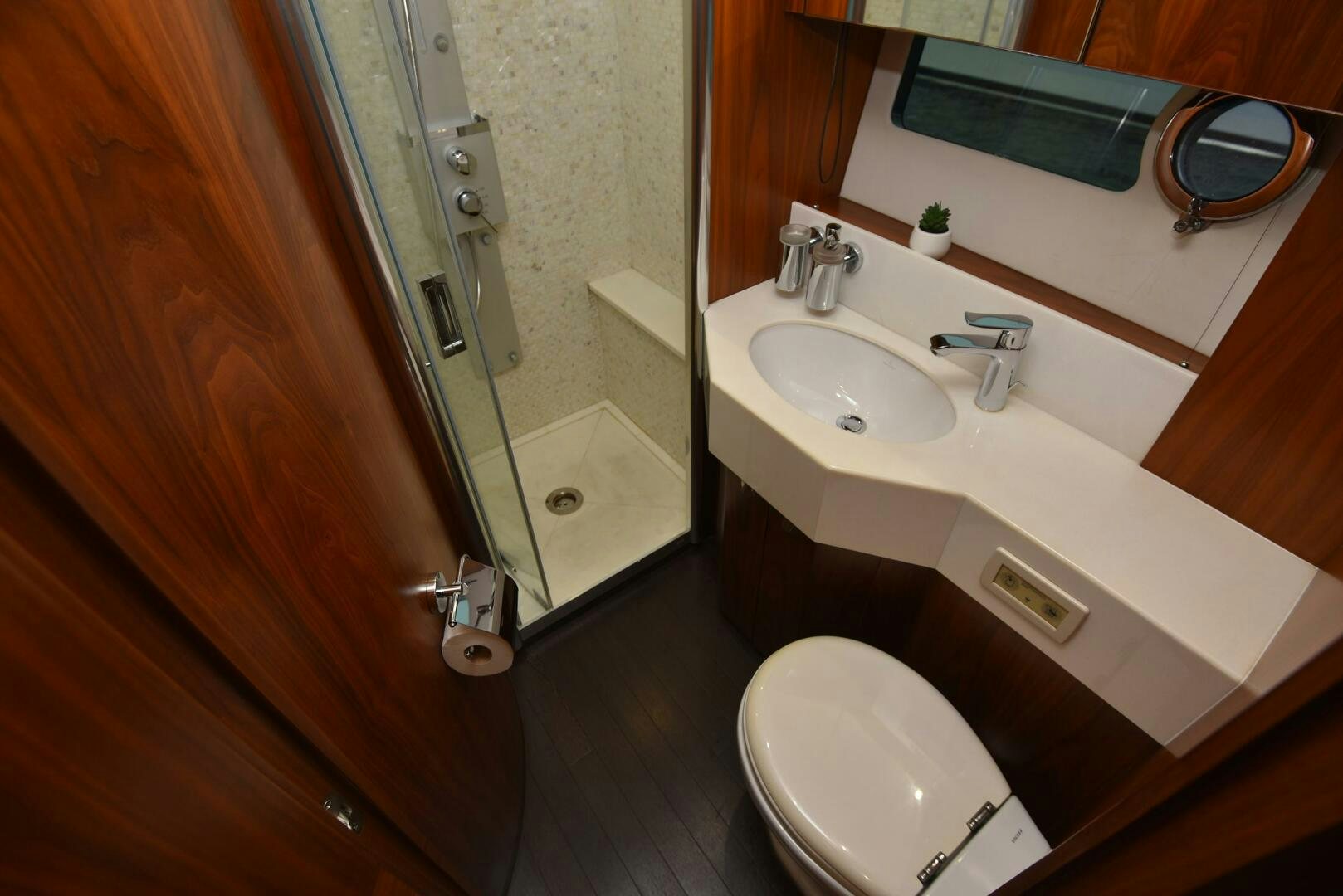 a bathroom with a sink and a toilet aboard SAVI II  Yacht for Sale