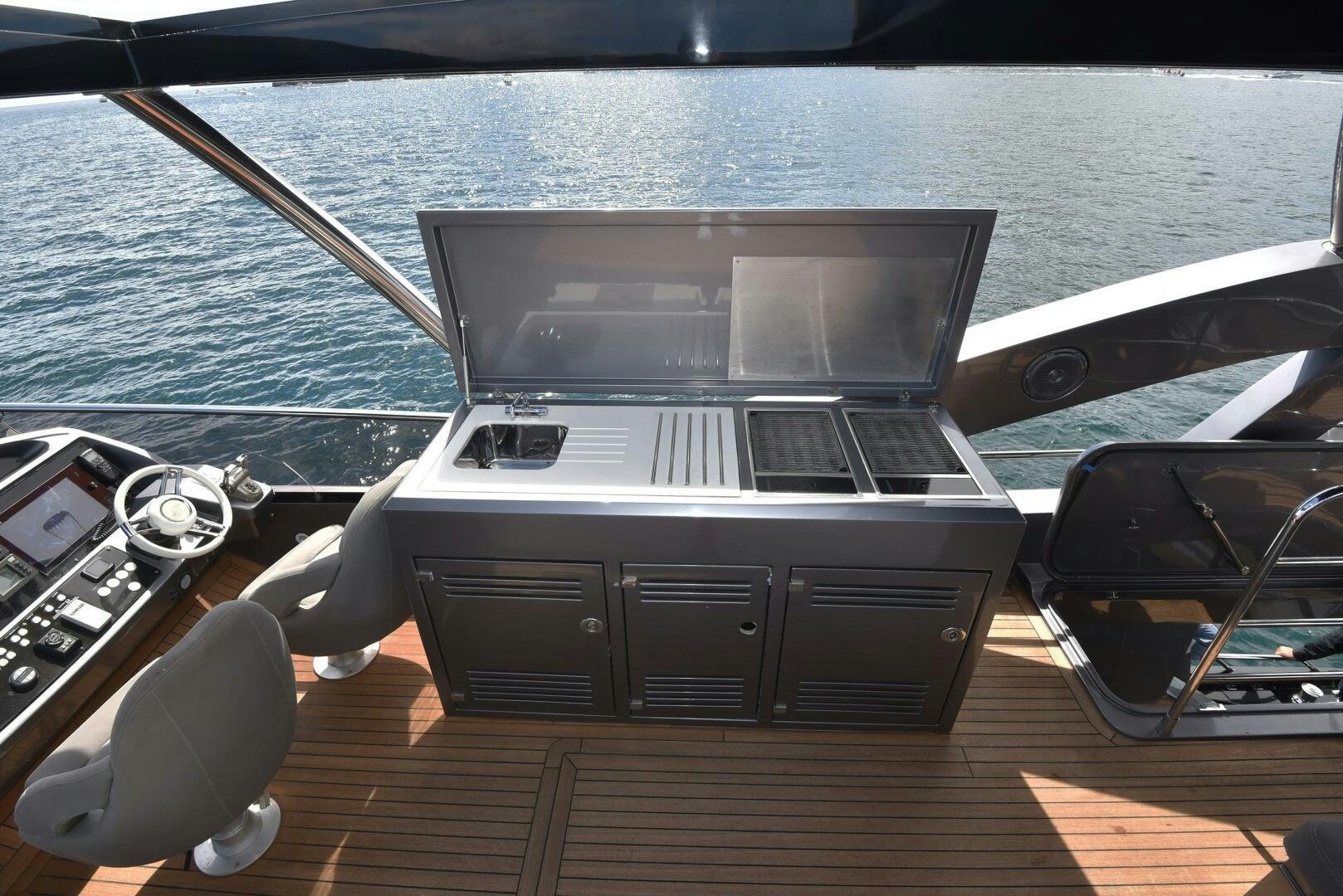 a car with a laptop on it aboard SAVI II  Yacht for Sale