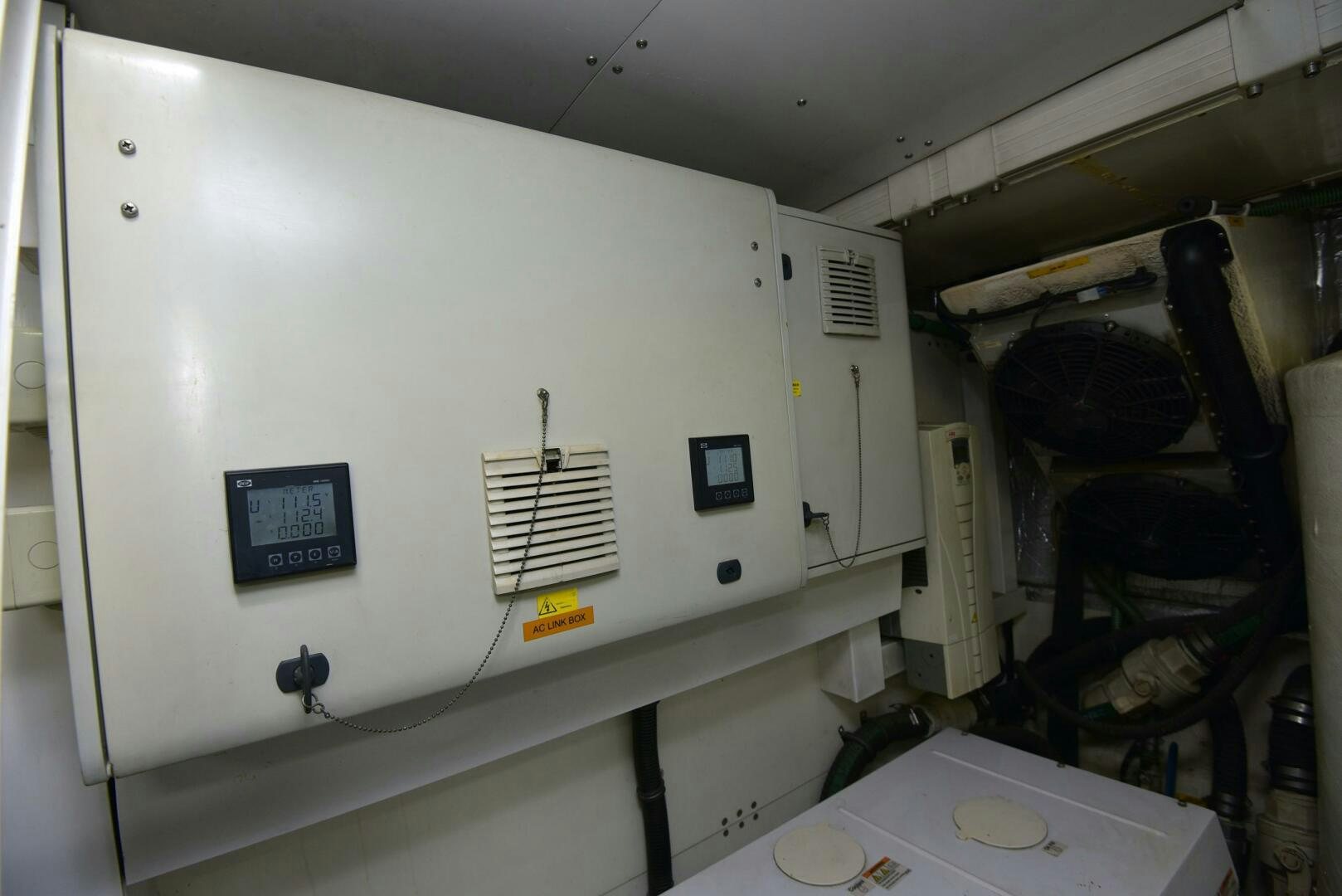 a white machine with a screen aboard SAVI II  Yacht for Sale
