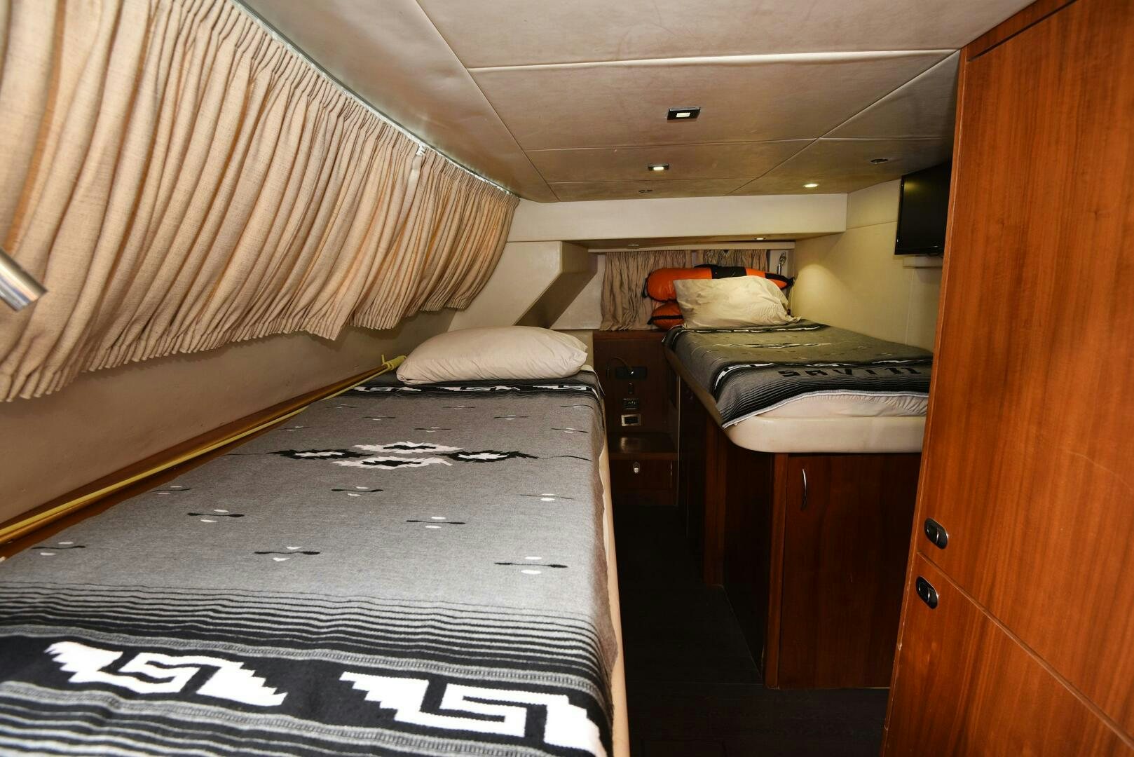a room with two beds aboard SAVI II  Yacht for Sale