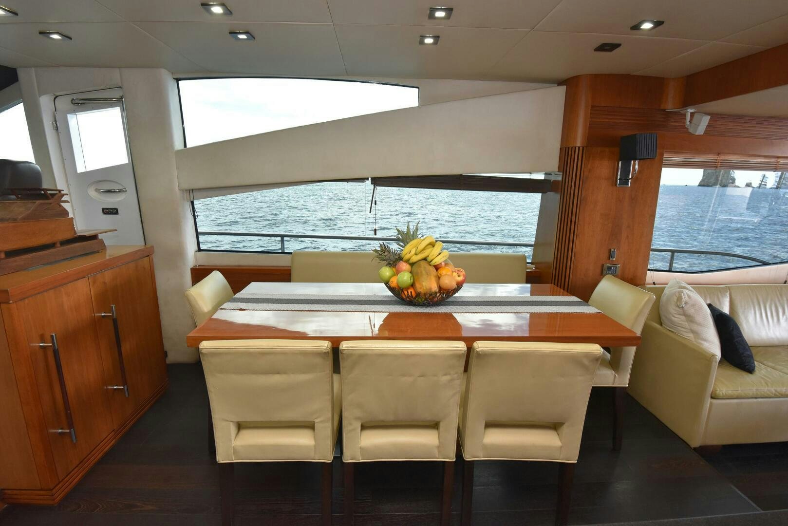 a room with a table and chairs aboard SAVI II  Yacht for Sale