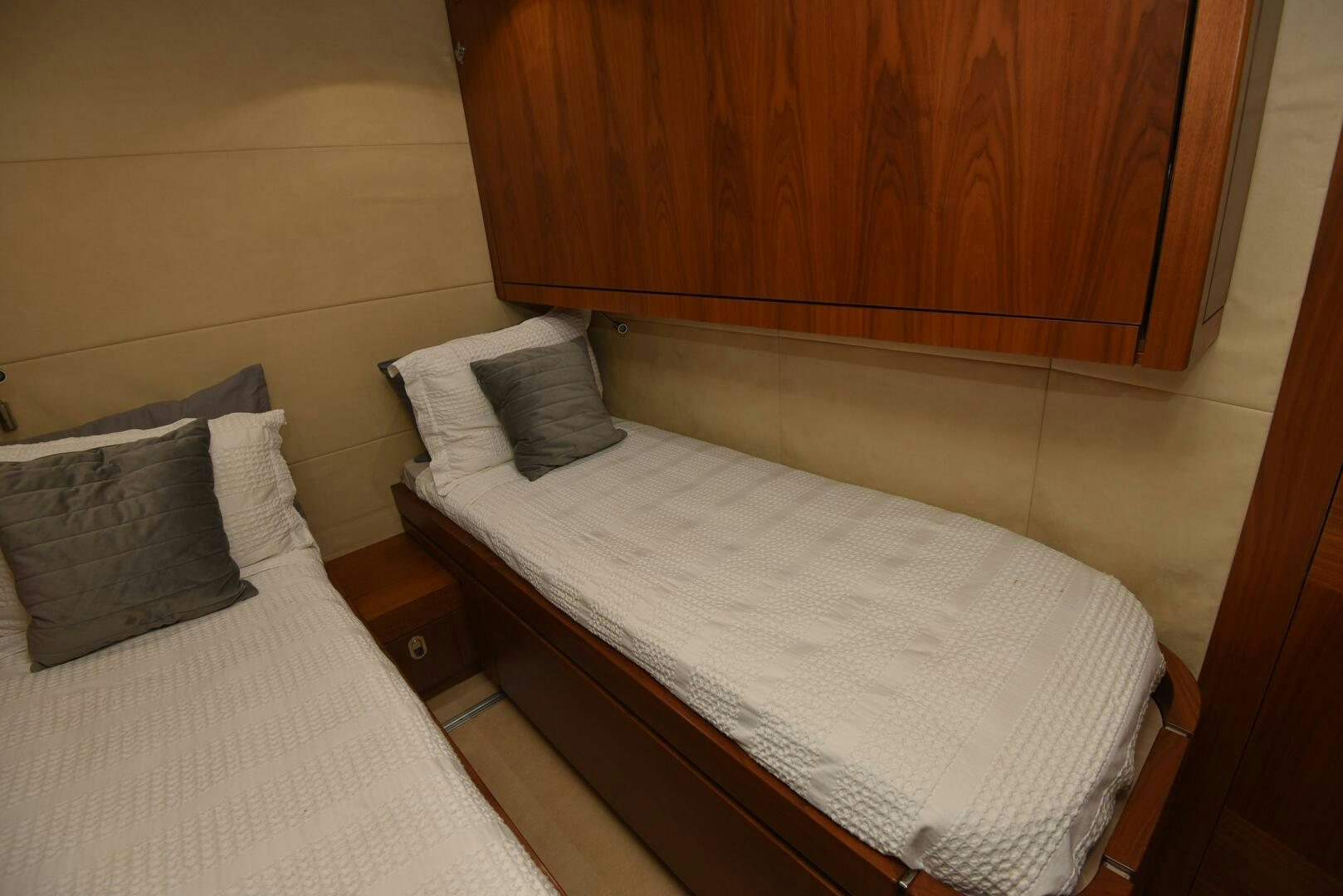 a couple of beds in a room aboard SAVI II  Yacht for Sale