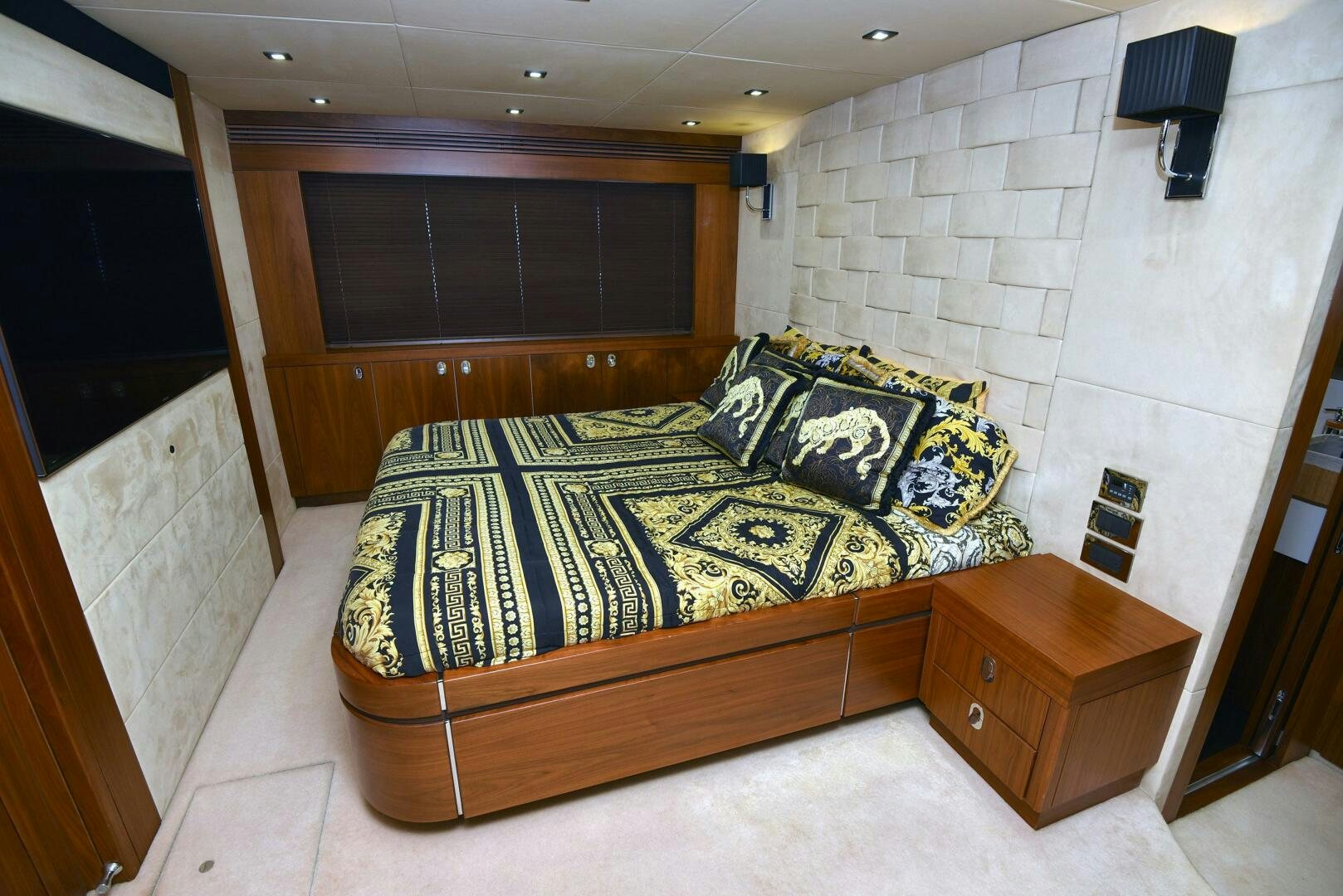 a bed in a room aboard SAVI II  Yacht for Sale