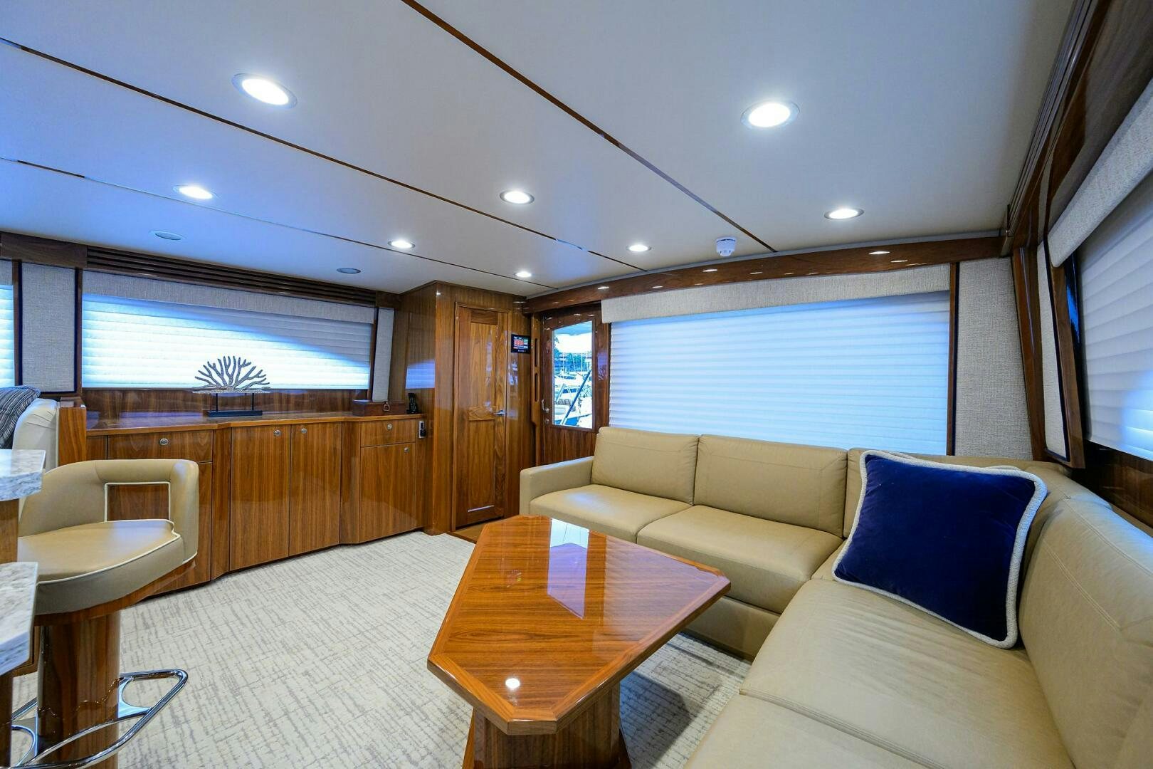 a living room with a couch and a table aboard TAMI ANN Yacht for Sale