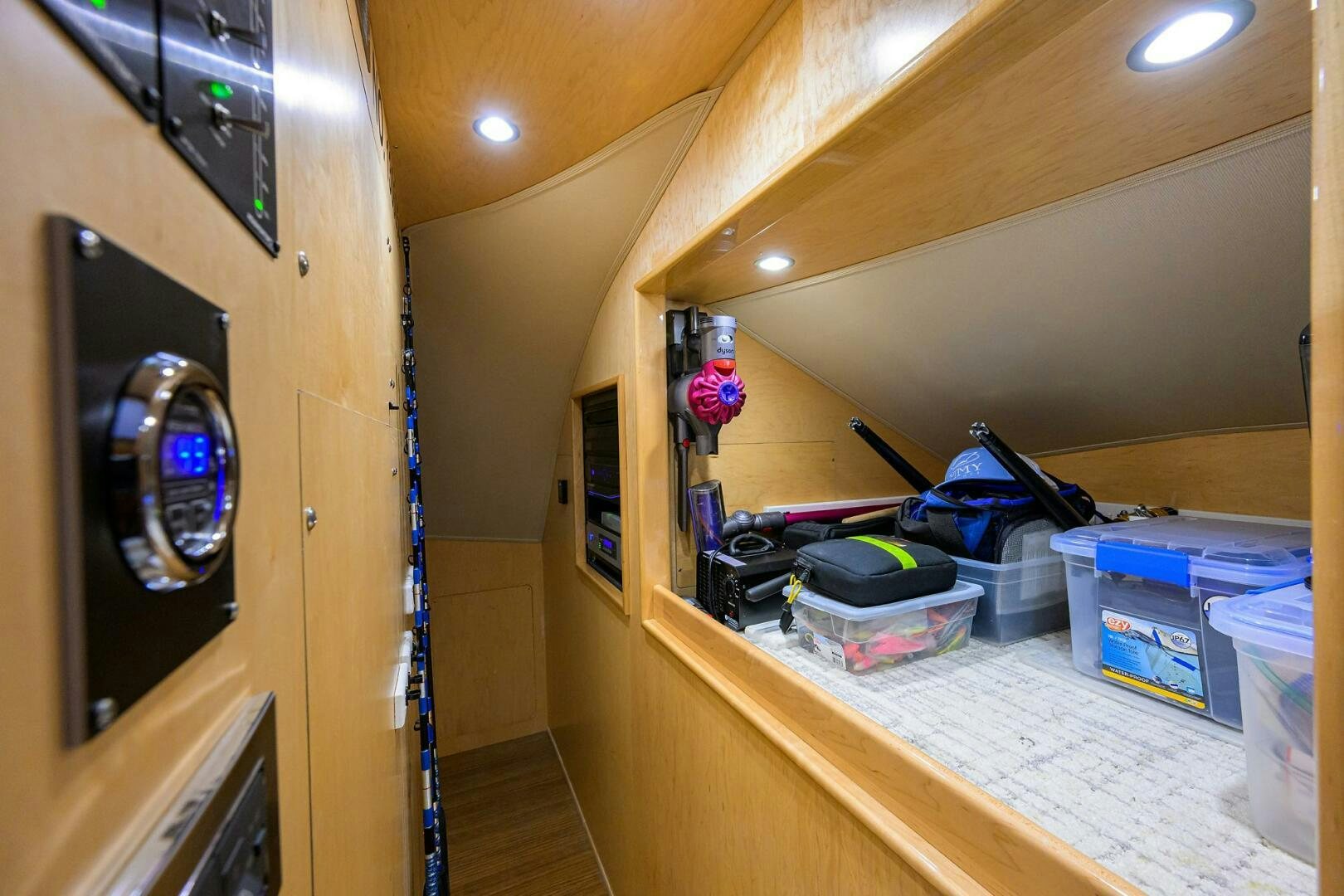 a room with a table and a mirror aboard TAMI ANN Yacht for Sale