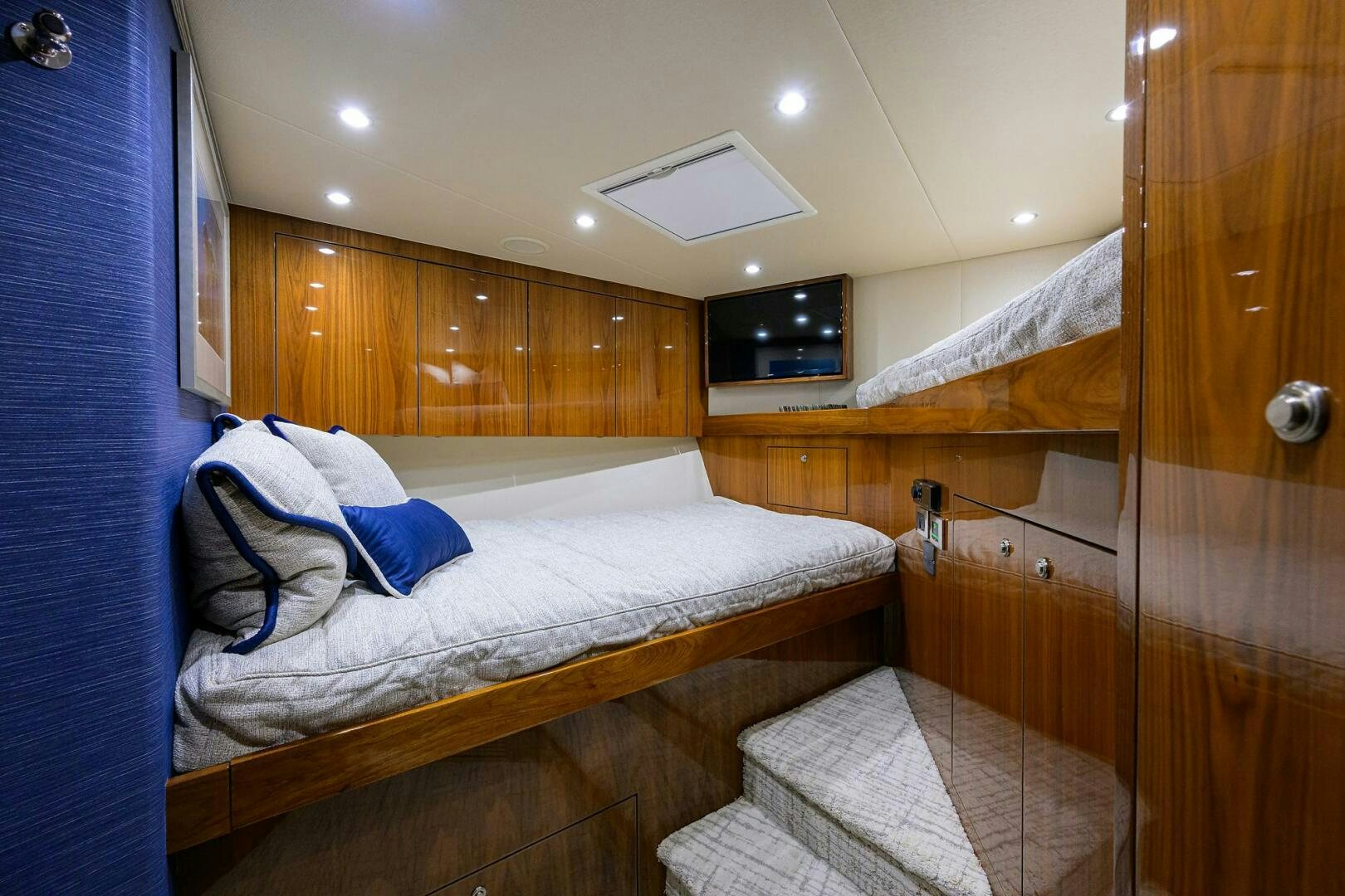 a room with wooden cabinets aboard TAMI ANN Yacht for Sale