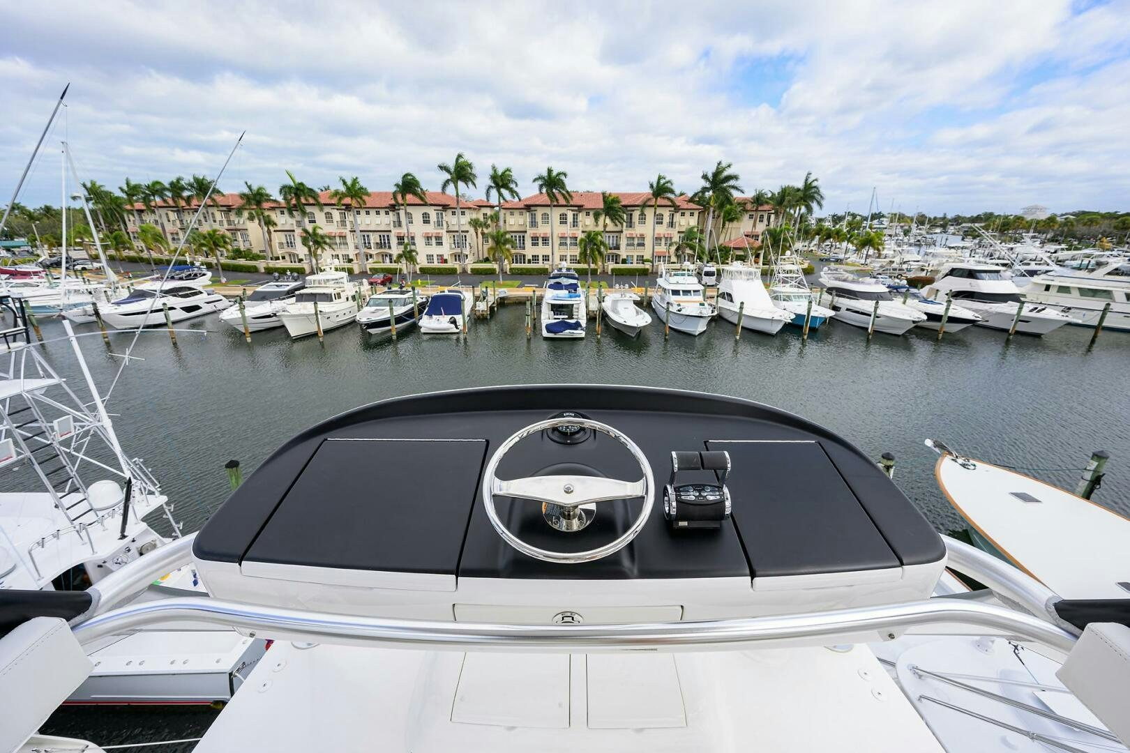a boat with a steering wheel aboard TAMI ANN Yacht for Sale
