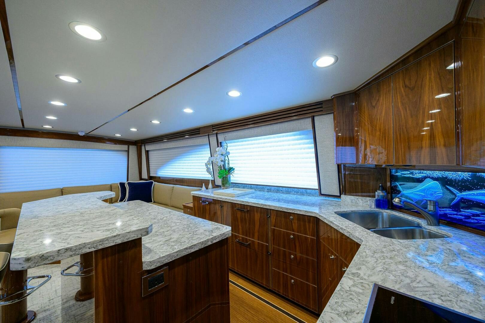 a kitchen with wooden cabinets aboard TAMI ANN Yacht for Sale