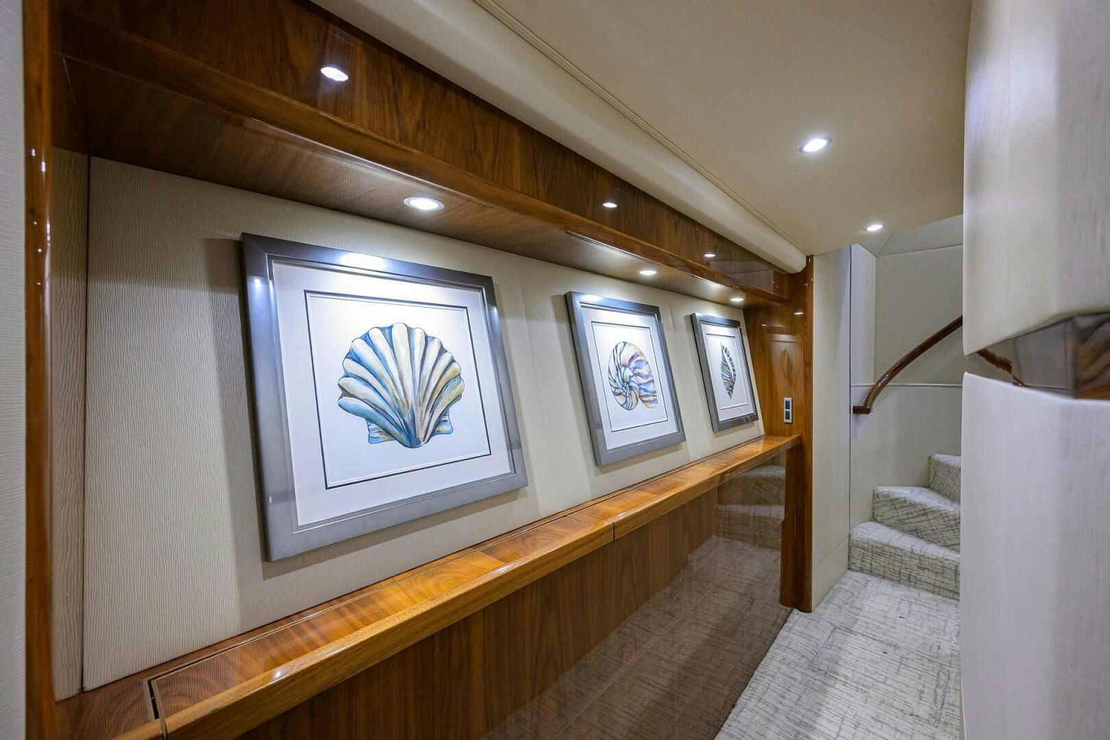 a room with a painting on the wall aboard TAMI ANN Yacht for Sale