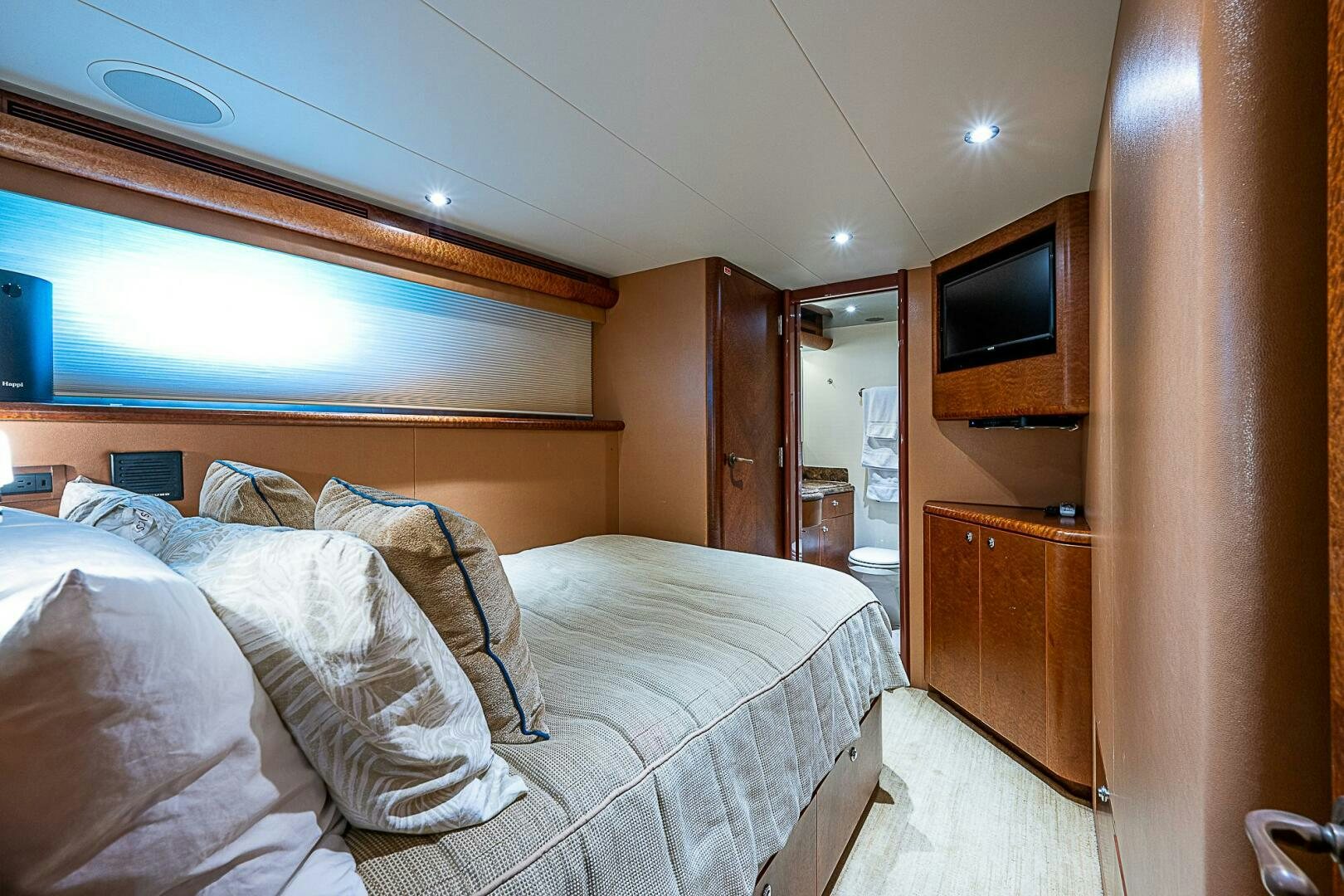 a bed in a room aboard PREDATOR Yacht for Sale