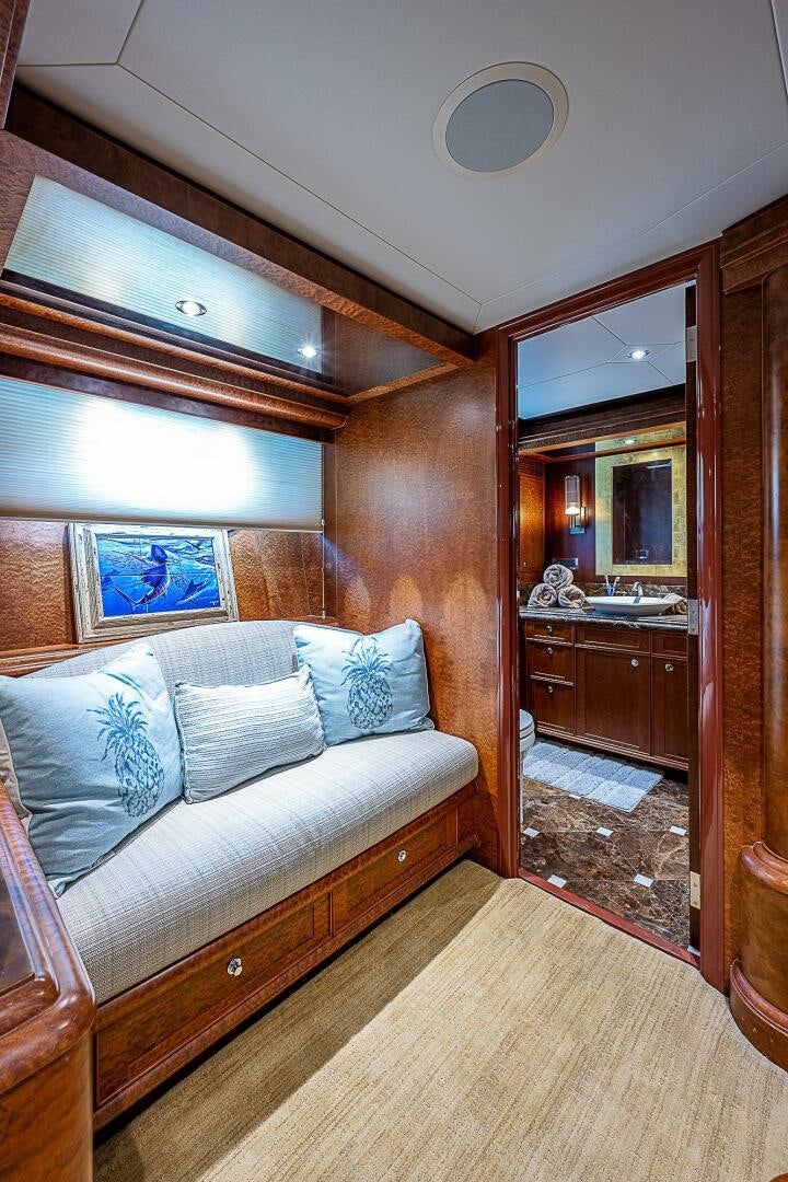 a bed in a room aboard PREDATOR Yacht for Sale