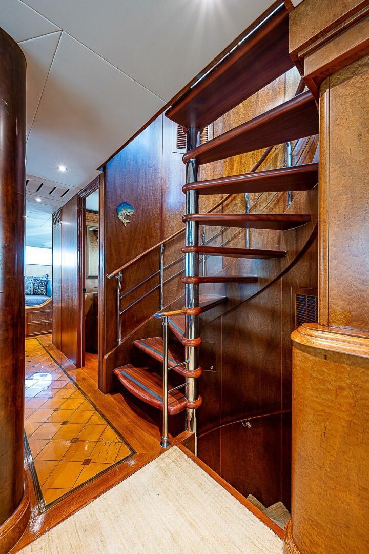 a hallway with wood walls aboard PREDATOR Yacht for Sale