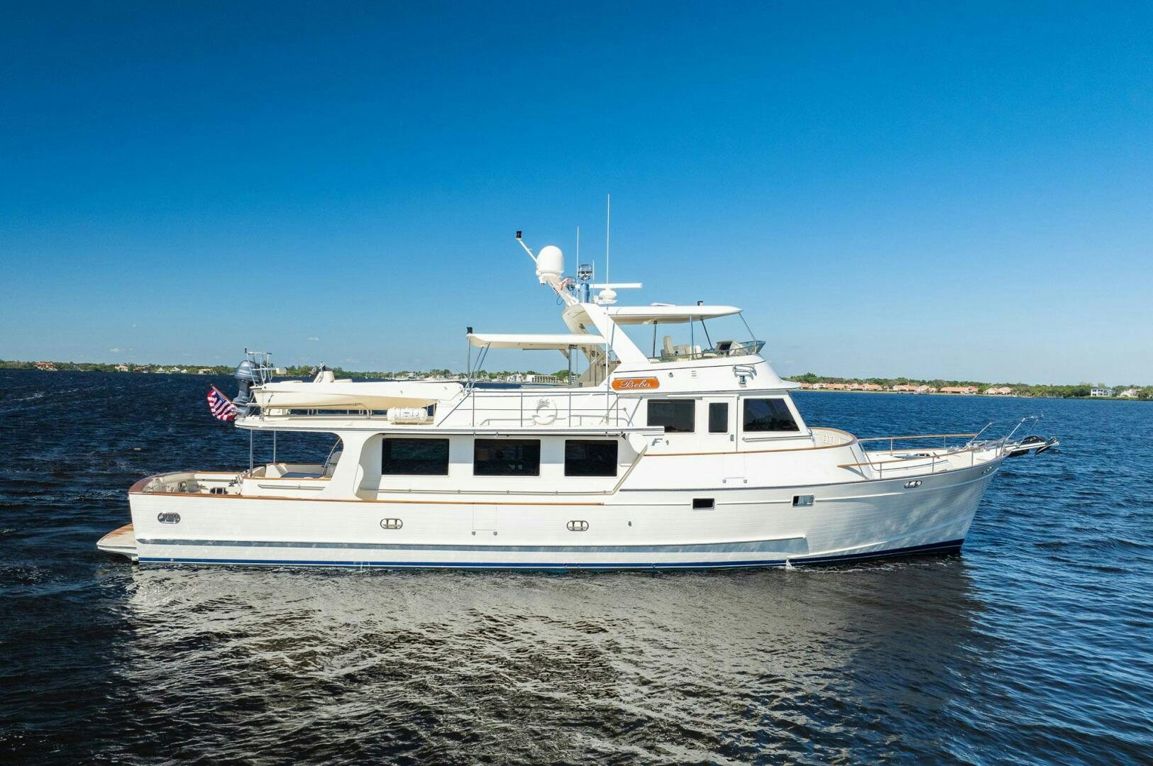 a large white boat in the water aboard BEBA Yacht for Sale