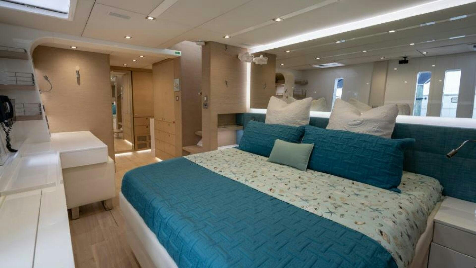 a large bed in a room aboard WILDBERRY Yacht for Sale