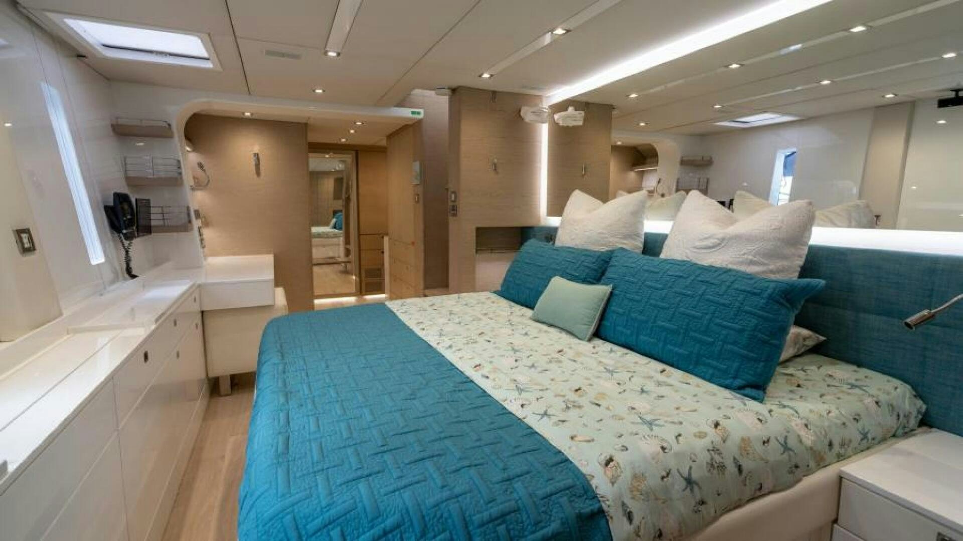 a bed in a room aboard WILDBERRY Yacht for Sale