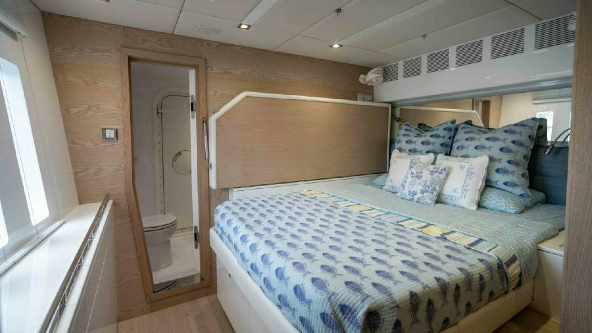 a bed in a room aboard WILDBERRY Yacht for Sale