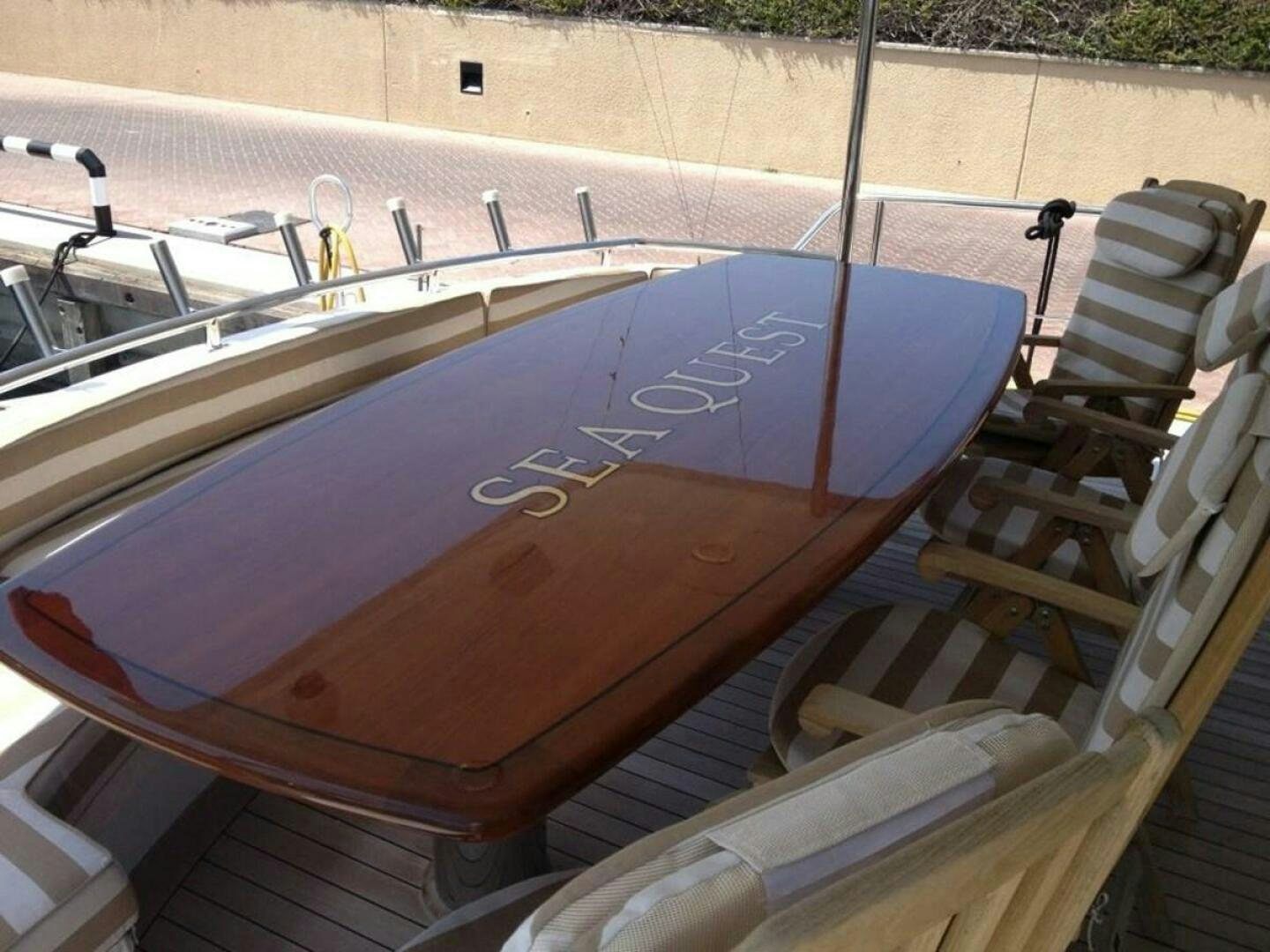 a boat with a blue and white sail aboard SEAQUEST Yacht for Sale