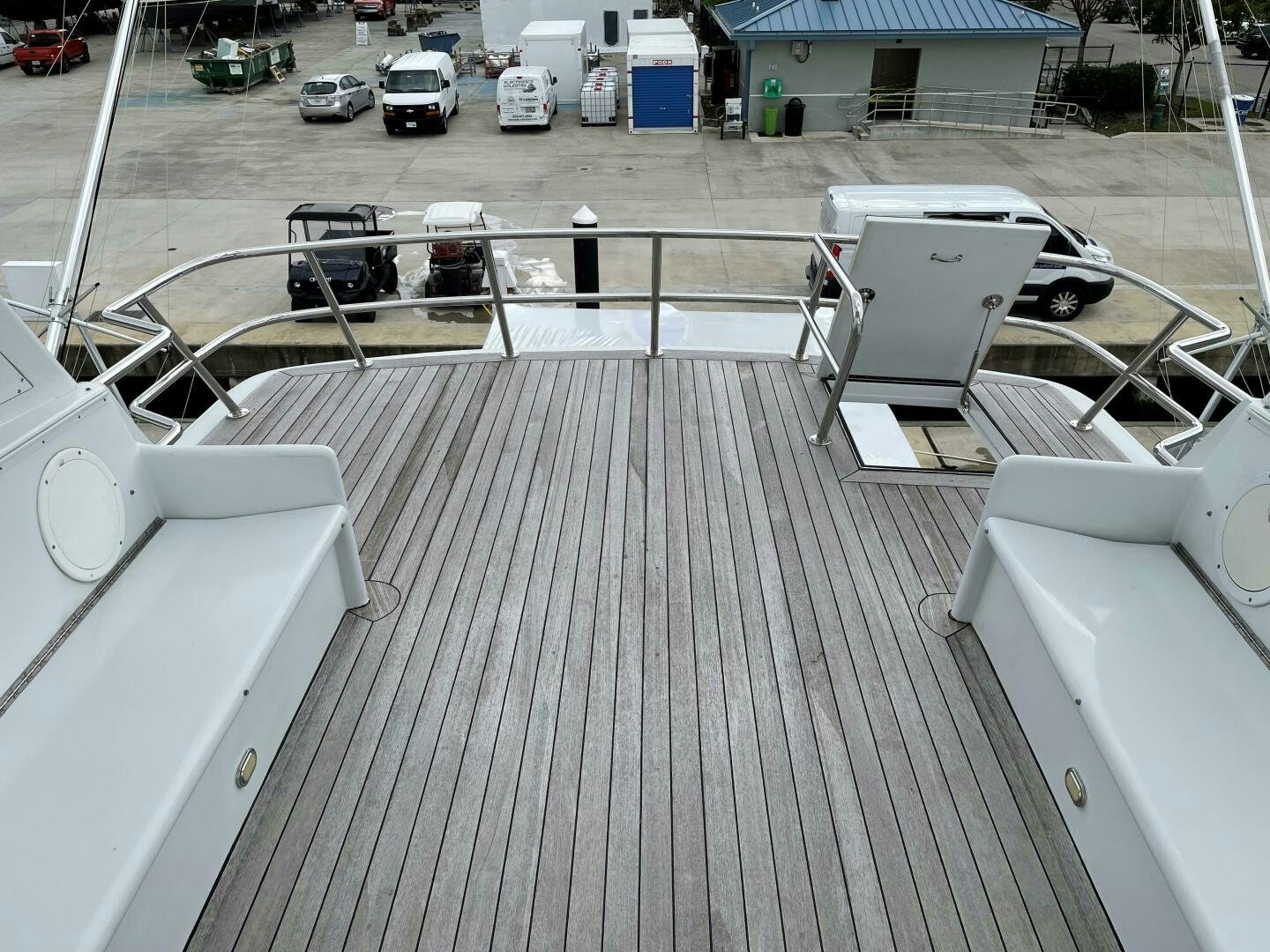 a deck with a car parked on it aboard SEAQUEST Yacht for Sale
