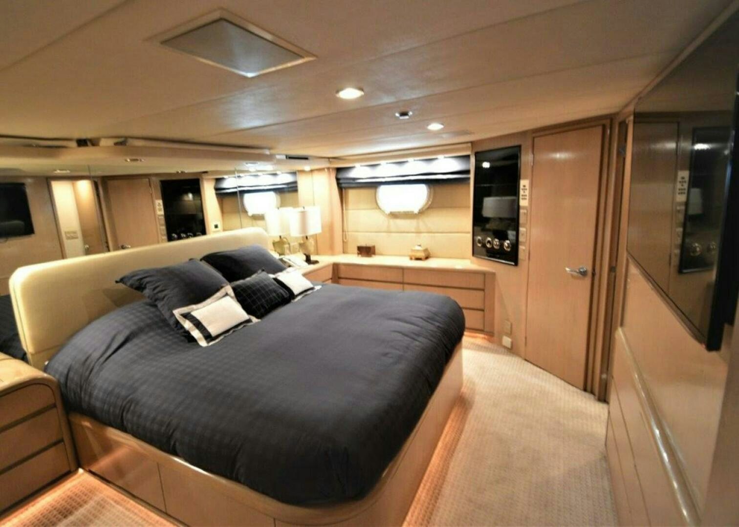 a large bed in a room aboard SEAQUEST Yacht for Sale