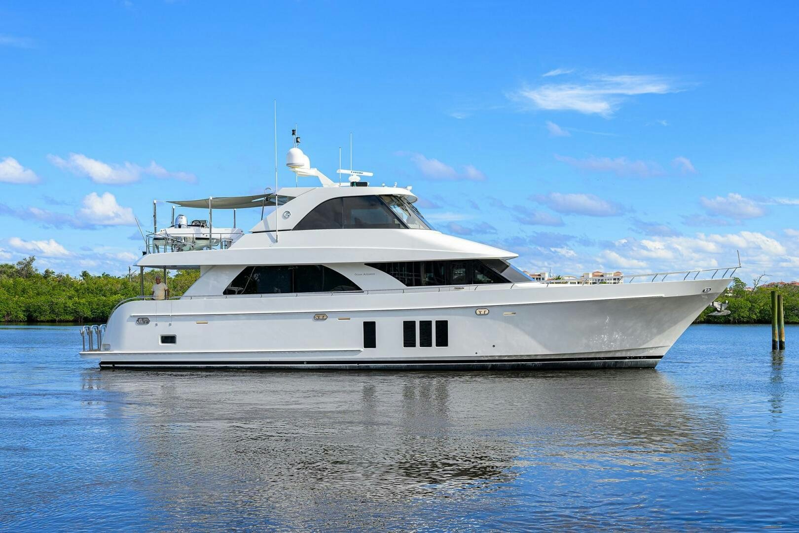 a white yacht on the water aboard JANE E Yacht for Sale