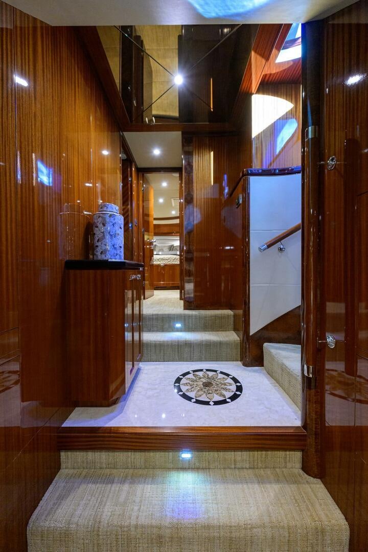 a room with a large mirror aboard JANE E Yacht for Sale