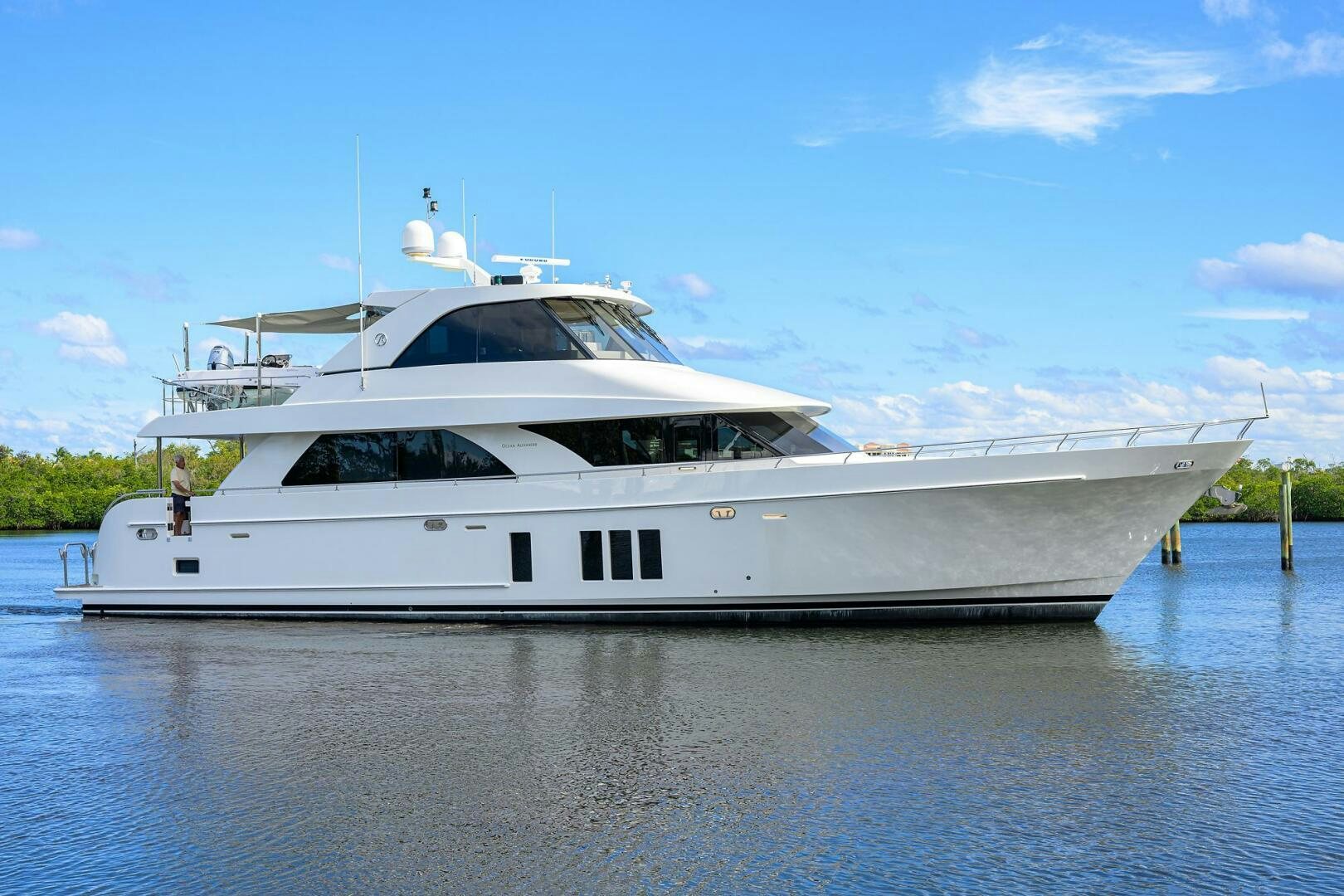 a white yacht on the water aboard JANE E Yacht for Sale